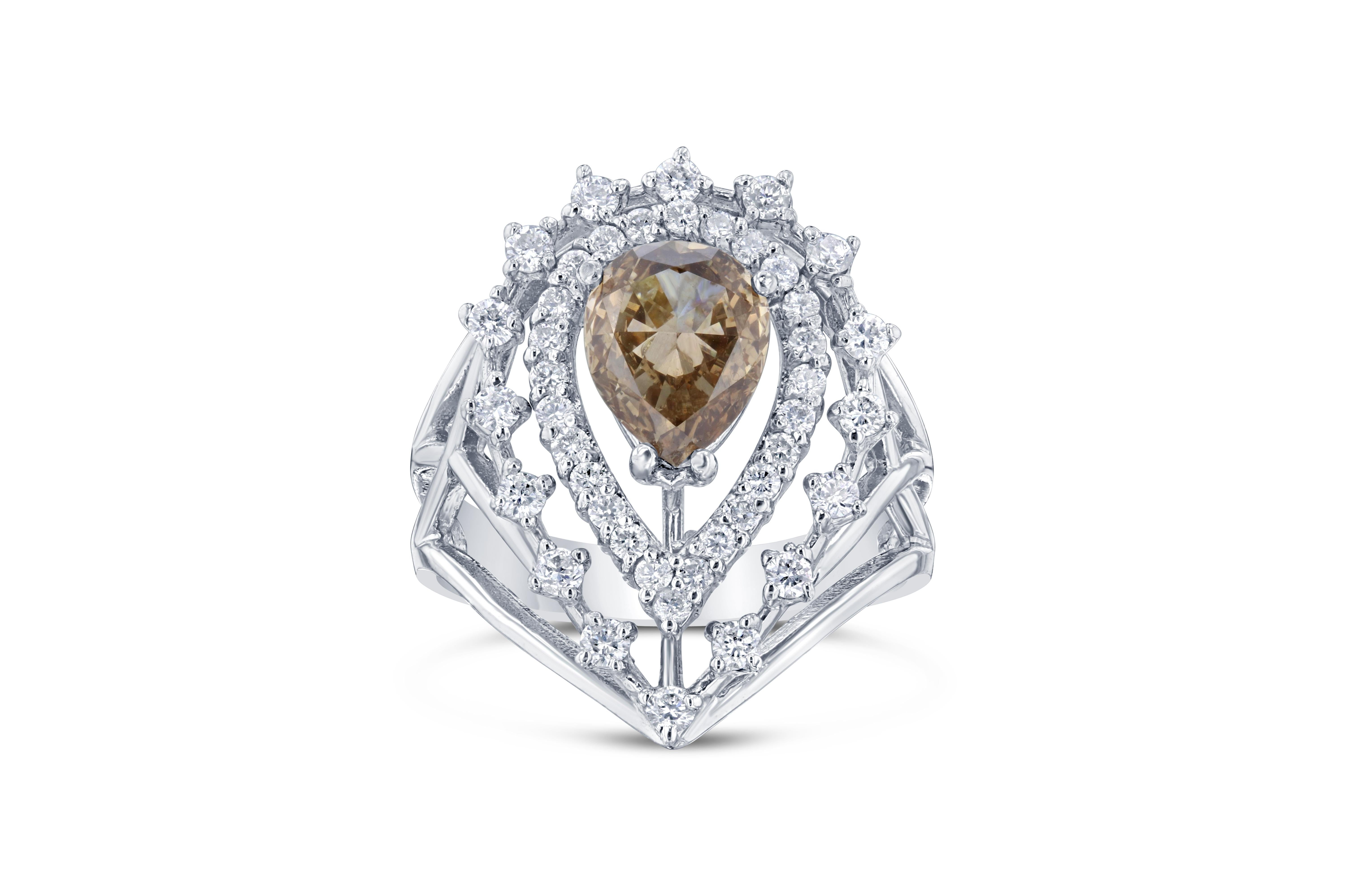This cocktail ring has a beautiful Brown Pear Cut Natural Diamond weighing 1.62 Carats and is surrounded by 42 Round Cut Diamonds that weigh 0.71 Carats. (SI/F)

It is beautifully set in a Victorian-Inspired 18 Karat White Gold setting and weighs