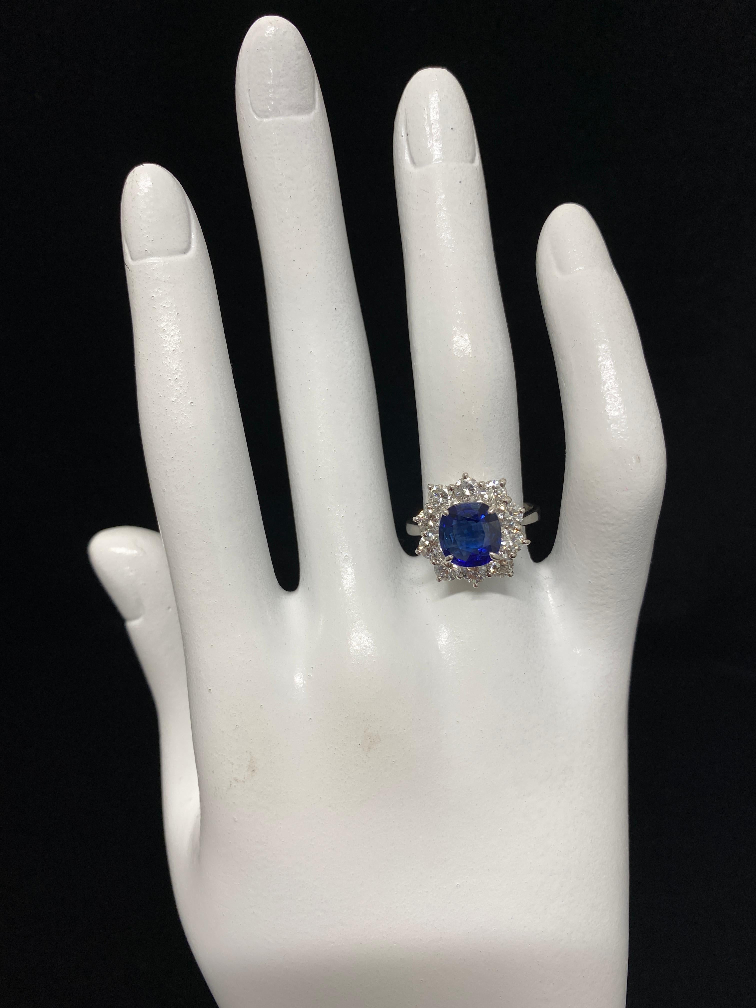 2.33 Carat Natural Sapphire and Diamond Halo Ring Set in Platinum 1