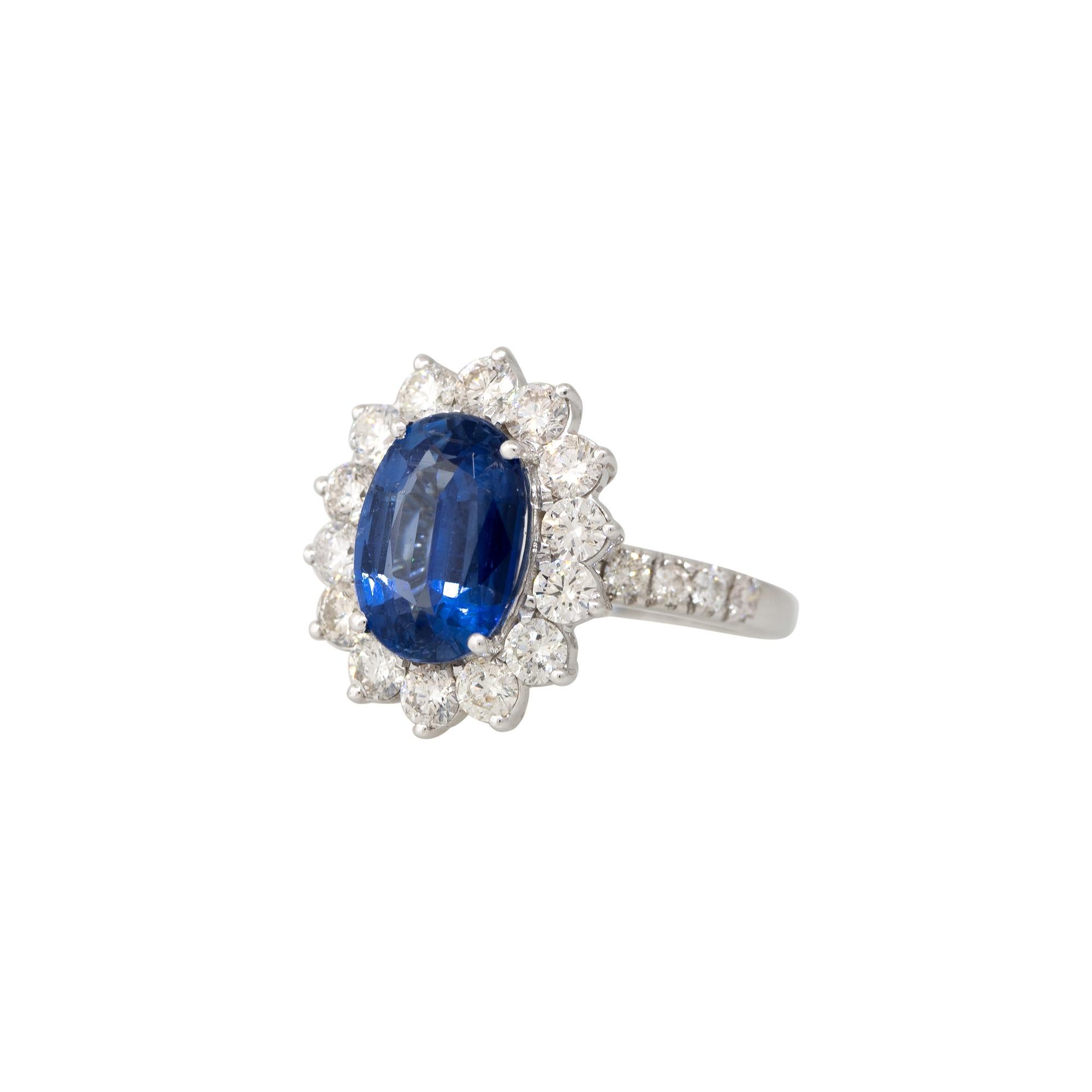 Modern 2.33 Carat Oval-Cut Kyanite & 1.18 Carat Diamond Halo Ring 18 Karat In Stock For Sale