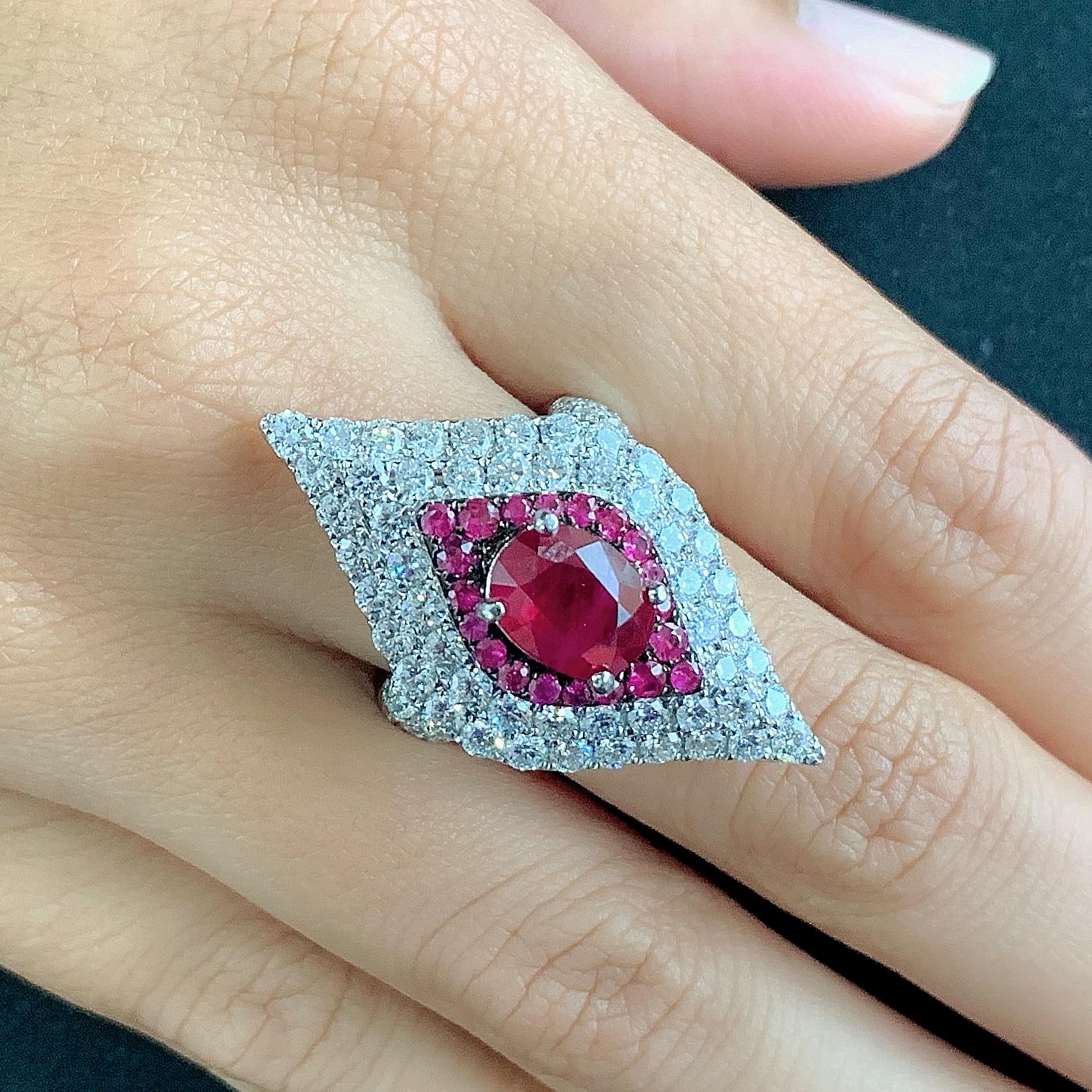 Contemporary 2.33 Carat Oval Ruby 18 Karat White Gold Diamond Cocktail Ring For Sale