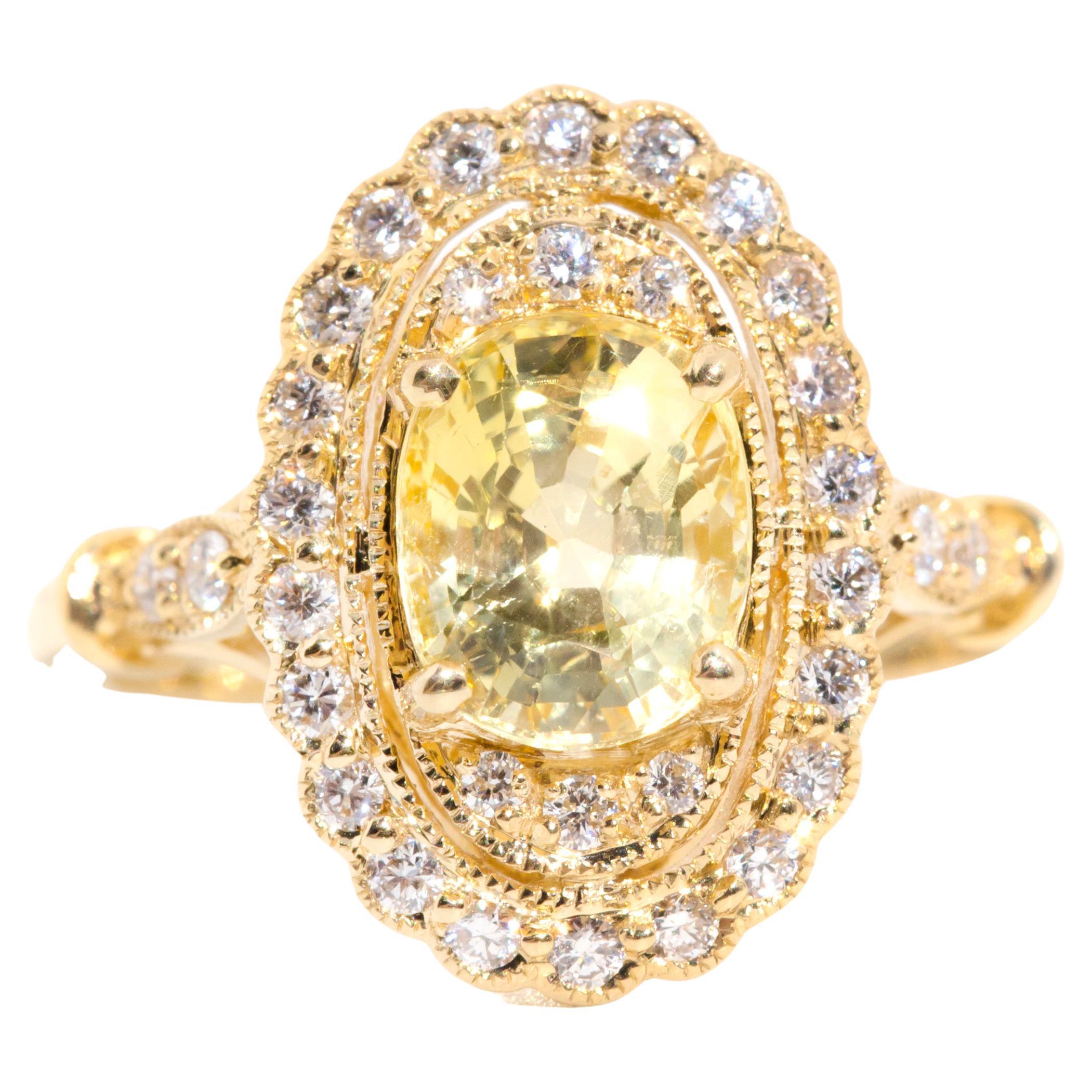 2.33 Carat Yellow Ceylon Sapphire and Diamond Halo Ring in 18 Carat Yellow Gold  For Sale