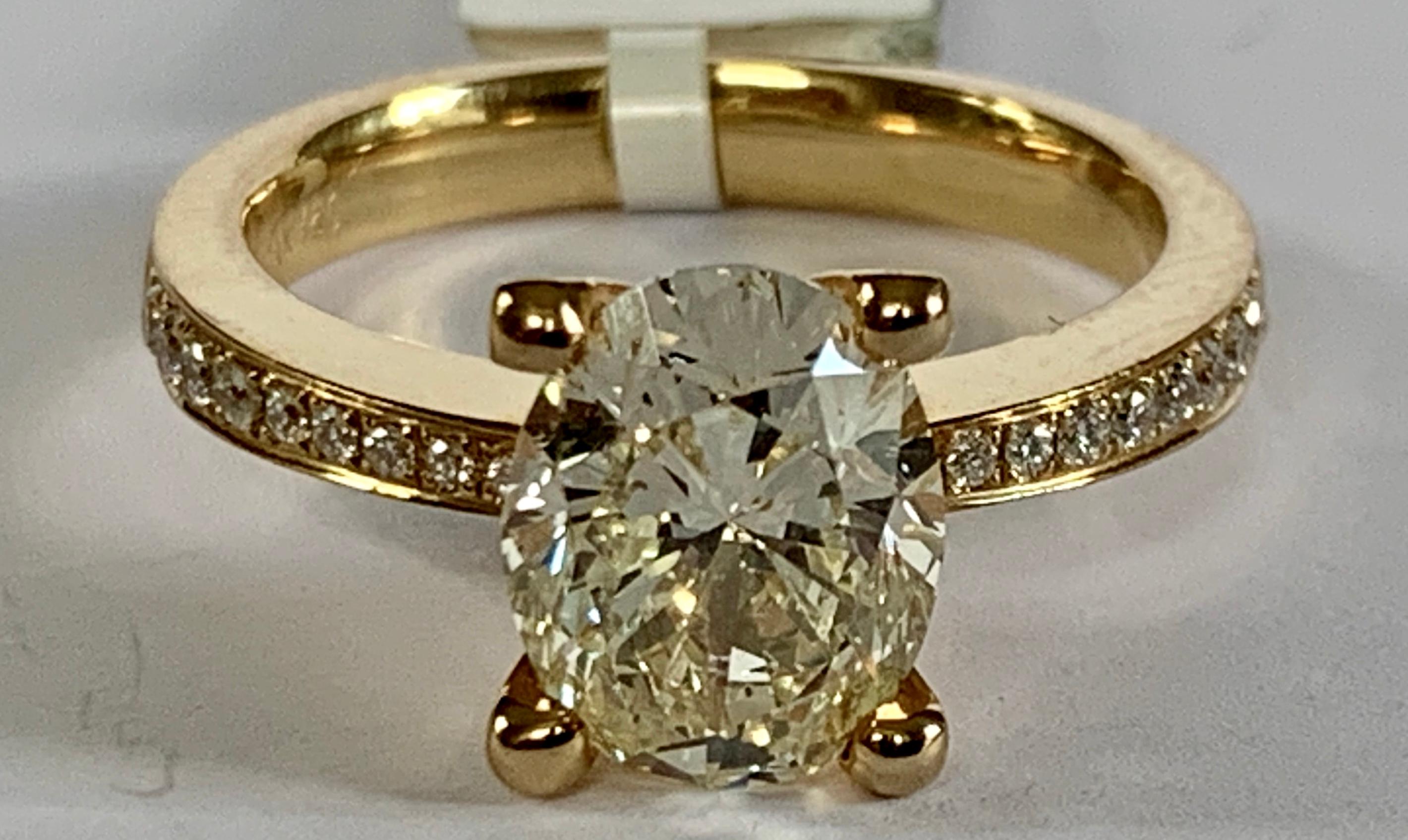 Oval Cut 2.33 Carat Oval Yellow Diamond Solitaire Ring For Sale