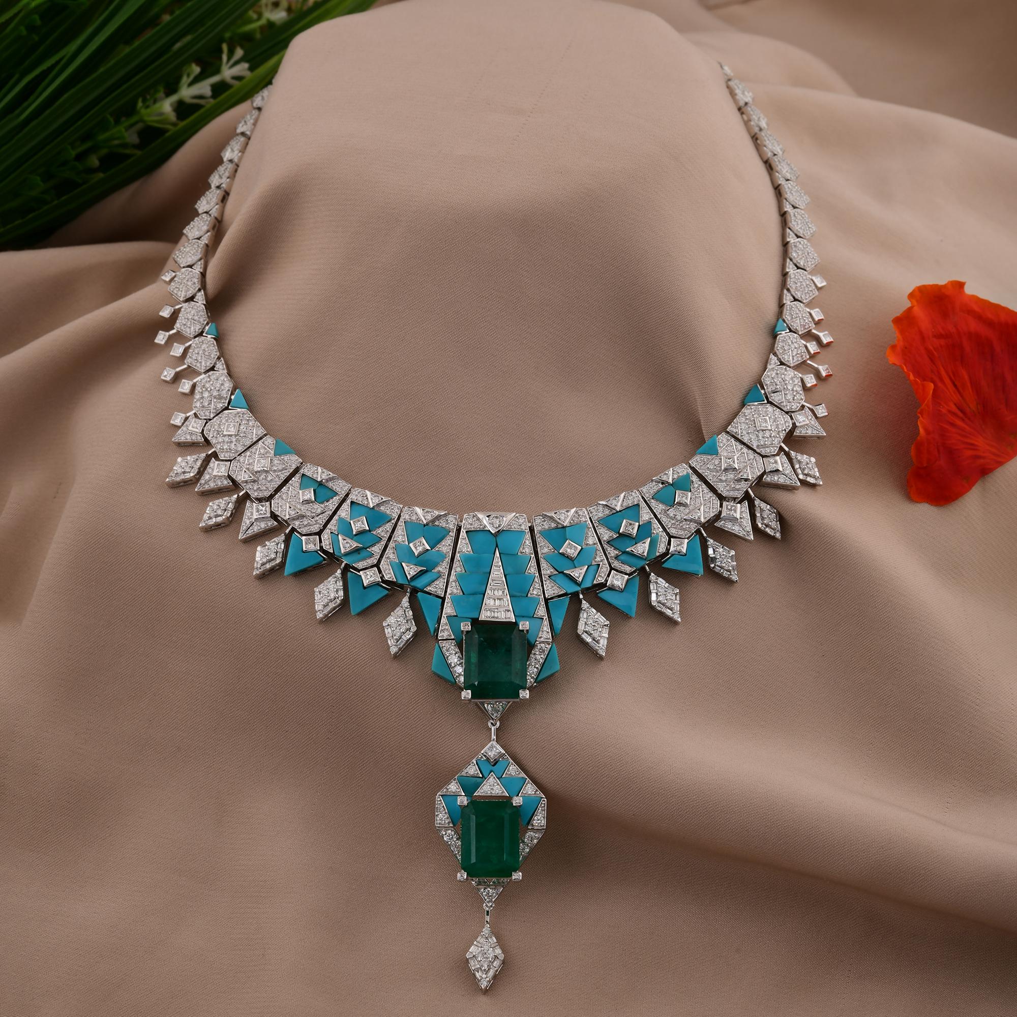 Cast from 14-karat gold, these exquisite necklace is handset with 11.90 carats Zambian emerald, 11.40 carats turquoise gemstone and 11.65 carats of sparkling diamonds.

FOLLOW SPECTRUM JEWELS storefront to view the latest collection & exclusive