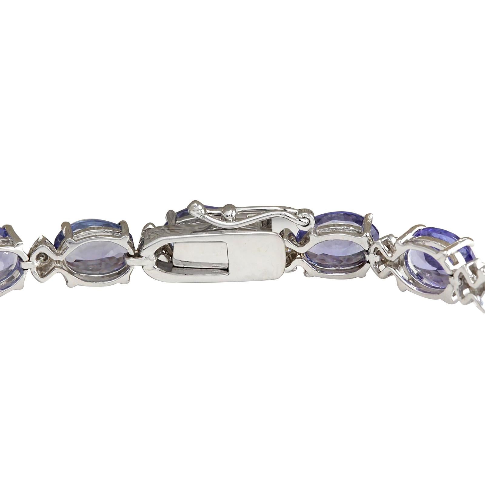 Stamped: 18K White Gold<br />Total Bracelet Weight: 10.0 Grams<br />Bracelet Length: 7.5 Inches<br />Bracelet Width: 5.90 mm<br />Gemstone Weight: Total  Tanzanite Weight is 22.65 Carat (Measures: 6.00x7.50 mm)<br />Color: Blue<br />Diamond Weight: