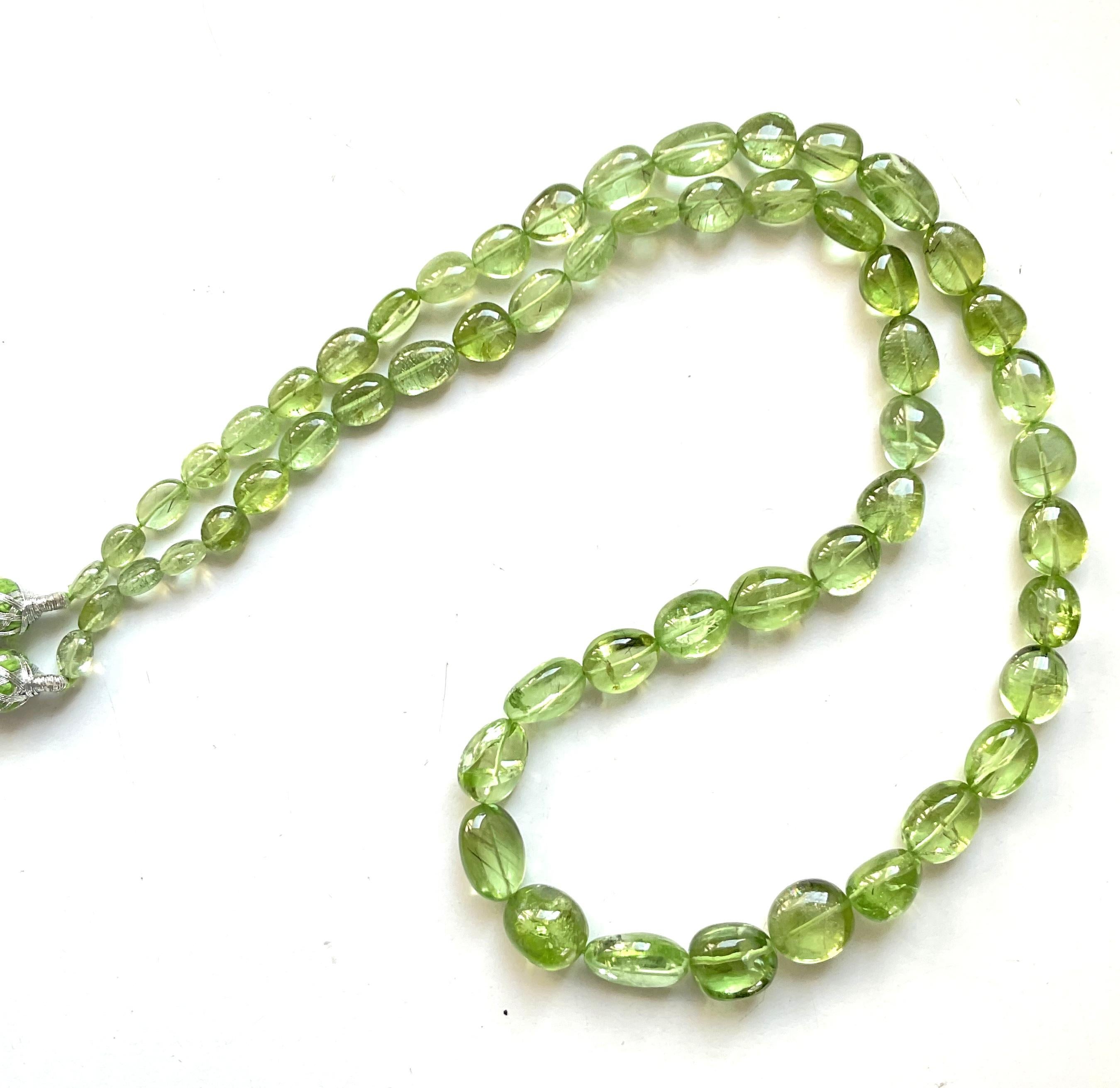 Tumbled 233.75 carats apple green peridot top quality plain tumbled natural necklace gem For Sale