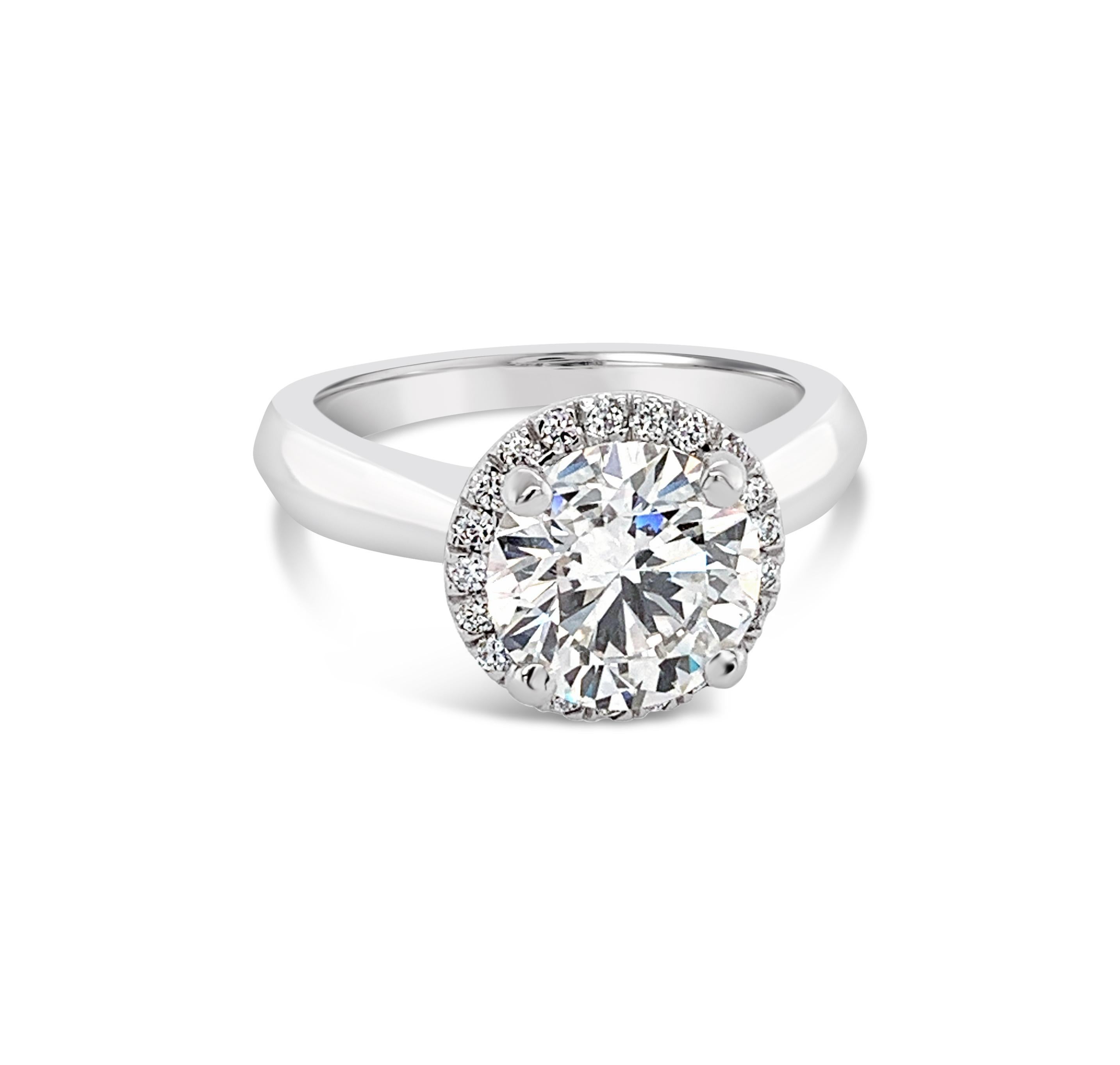 Brilliant Cut 2.34 Carat Round Brilliant Diamond Halo Ring in Platinum For Sale