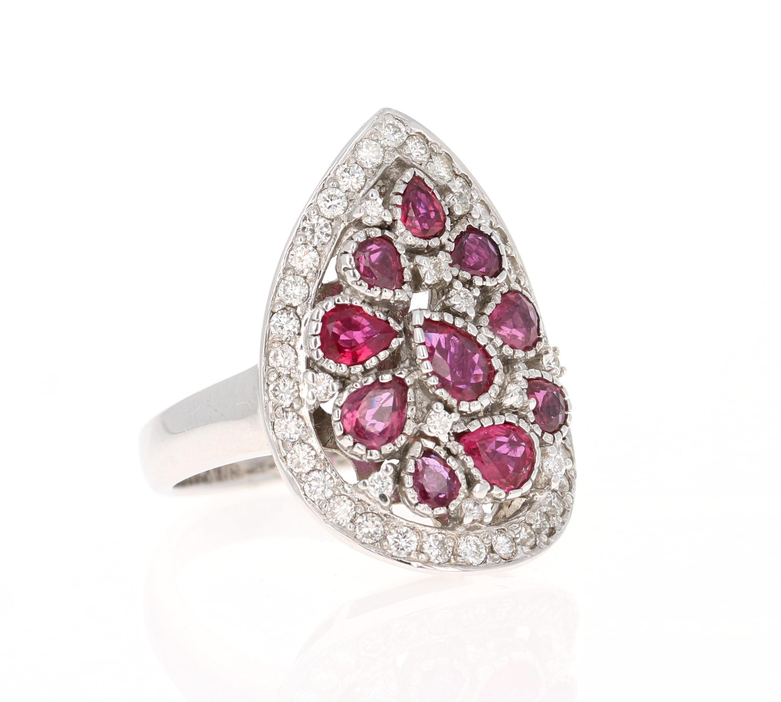 This ring has multiple Pear Cut Natural Red Rubies weighing 1.83 Carats and 41 Round Cut Diamonds weighing 0.51 Carats. The clarity and color of the diamonds are VS-H. The total carat weight of the ring is 2.34 Carats. 

The ring is beautifully