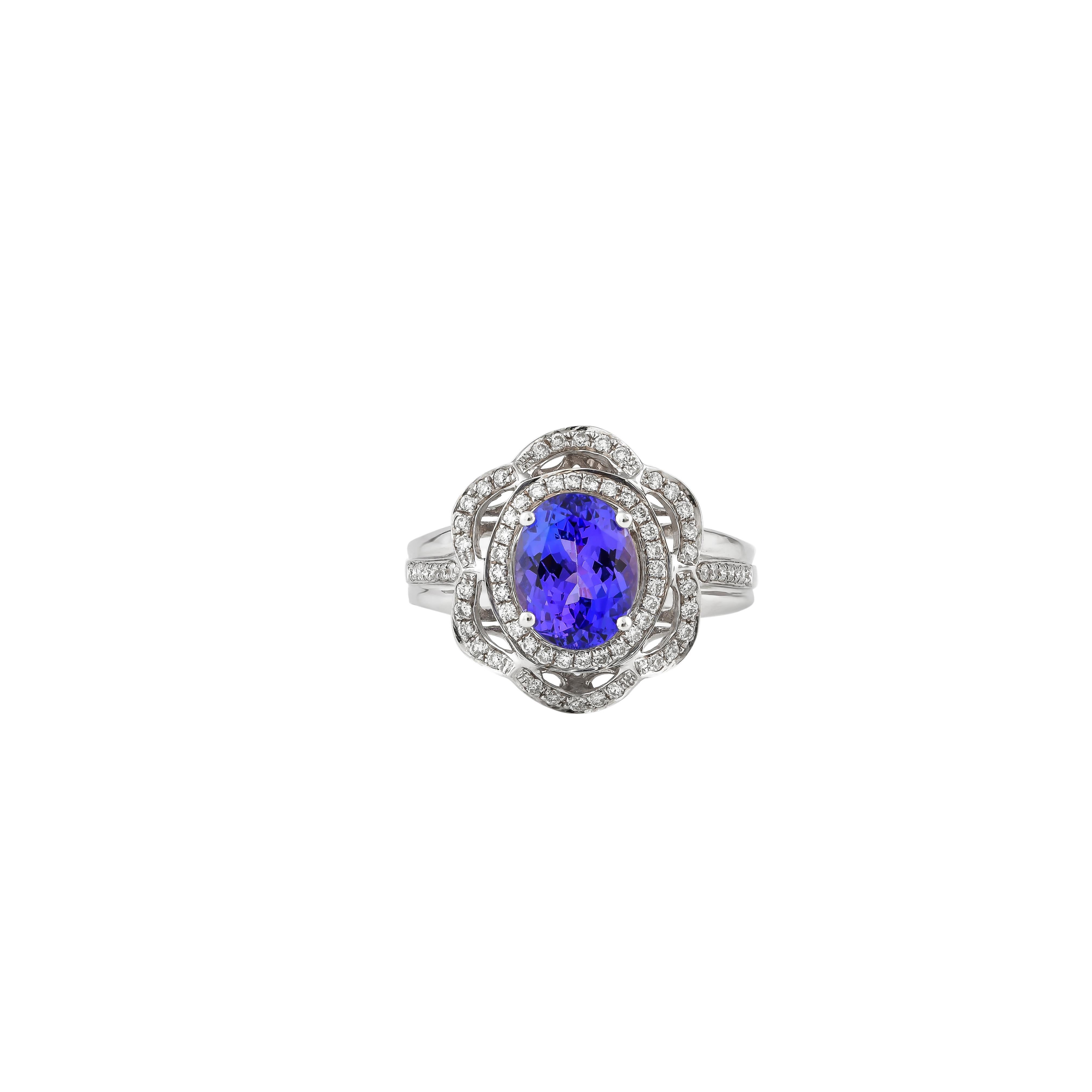 Contemporary 2.34 Carat Tanzanite Ring in 18 Karat White Gold with Diamond. For Sale