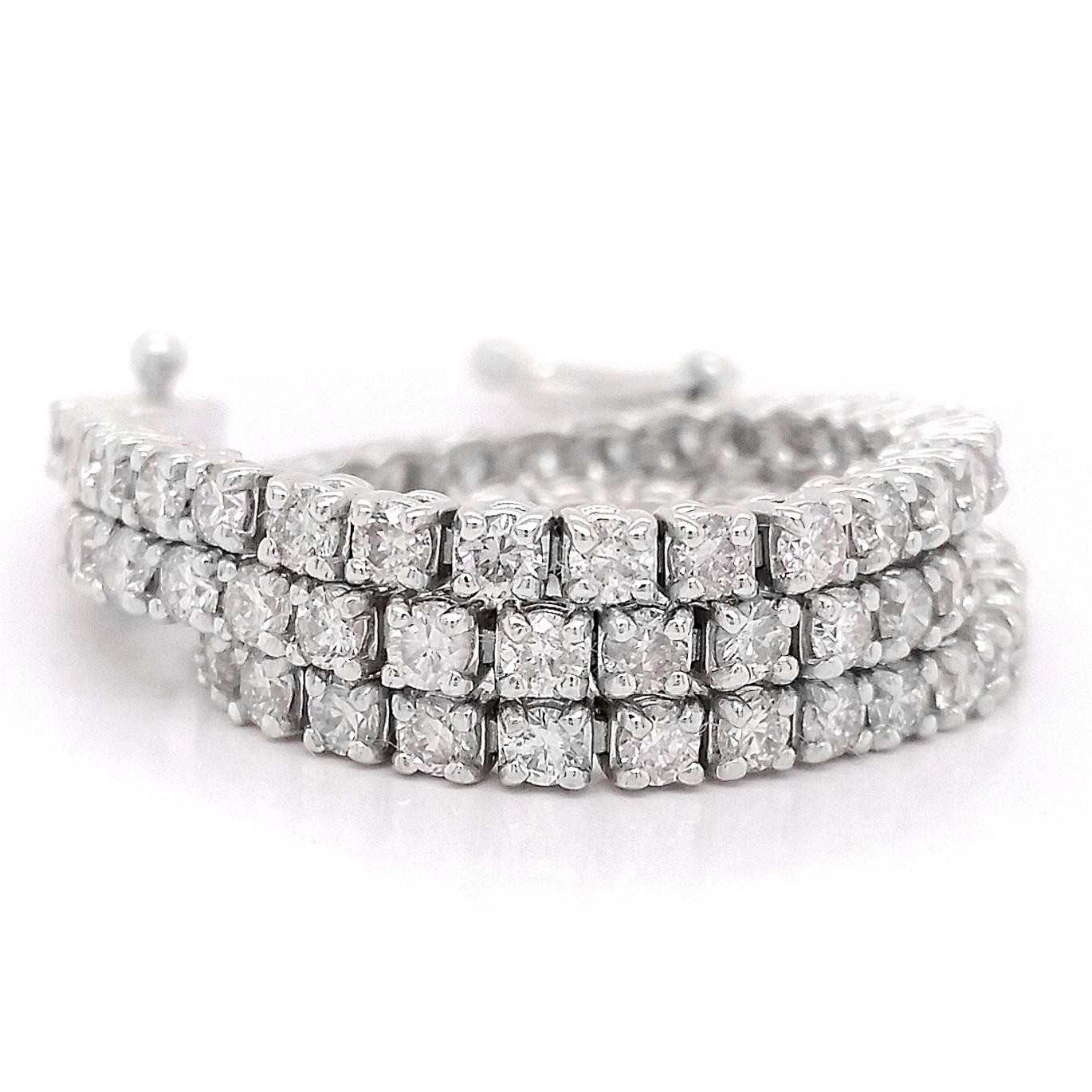 This classic and elegant 14kt white gold tennis bracelet showcases 82 endlessly sparkling diamonds, totaling 2.34 carat. This bracelet will give your favorite outfits unforgettable sparkle. 
For more information, please check the attached