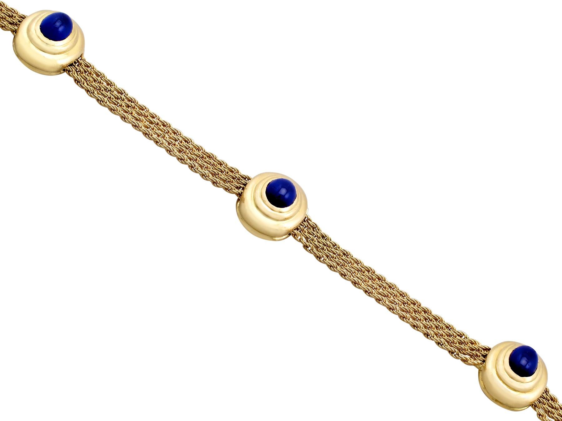 An impressive vintage 1960s 2.34 carat blue sapphire and 18 karat yellow gold bracelet; part of our diverse gemstone jewelry and estate jewelry collections.

This fine and impressive vintage sapphire bracelet has been crafted in 18k yellow