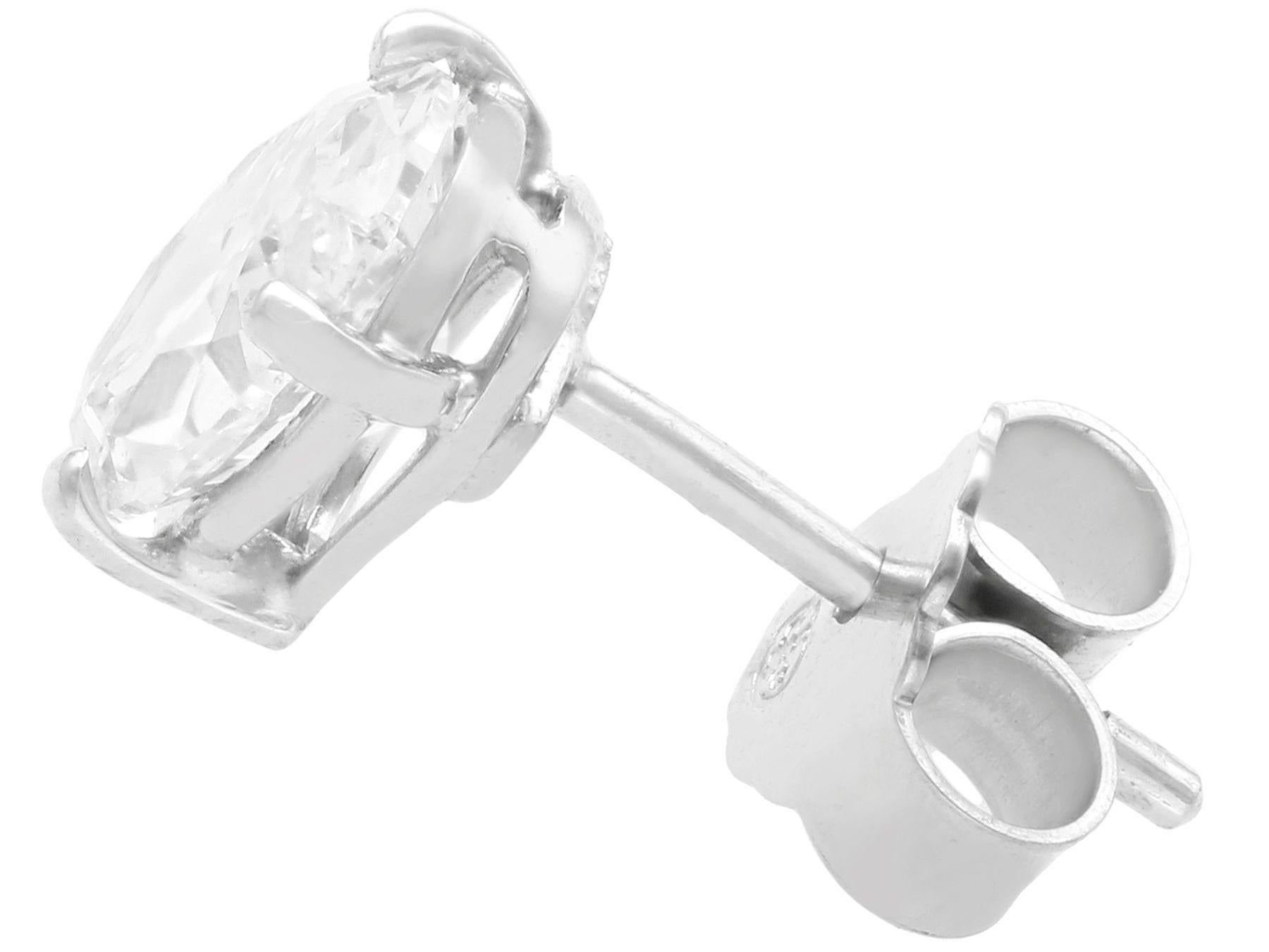 Oval Cut 2.35 Carat Diamond and White Gold Stud Earrings