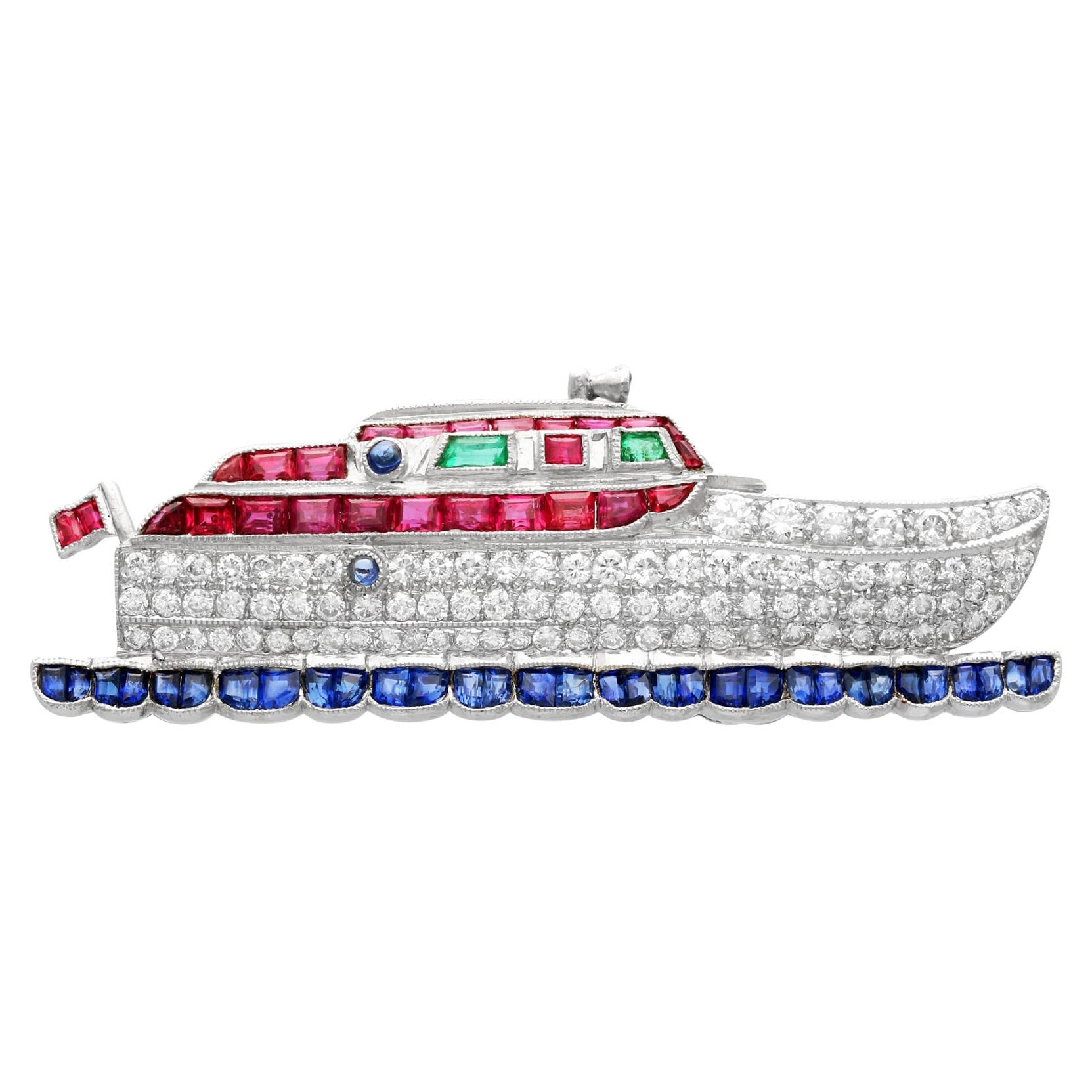 Broche bateau en or jaune 2,35 carats diamant saphir rubis et émeraude
