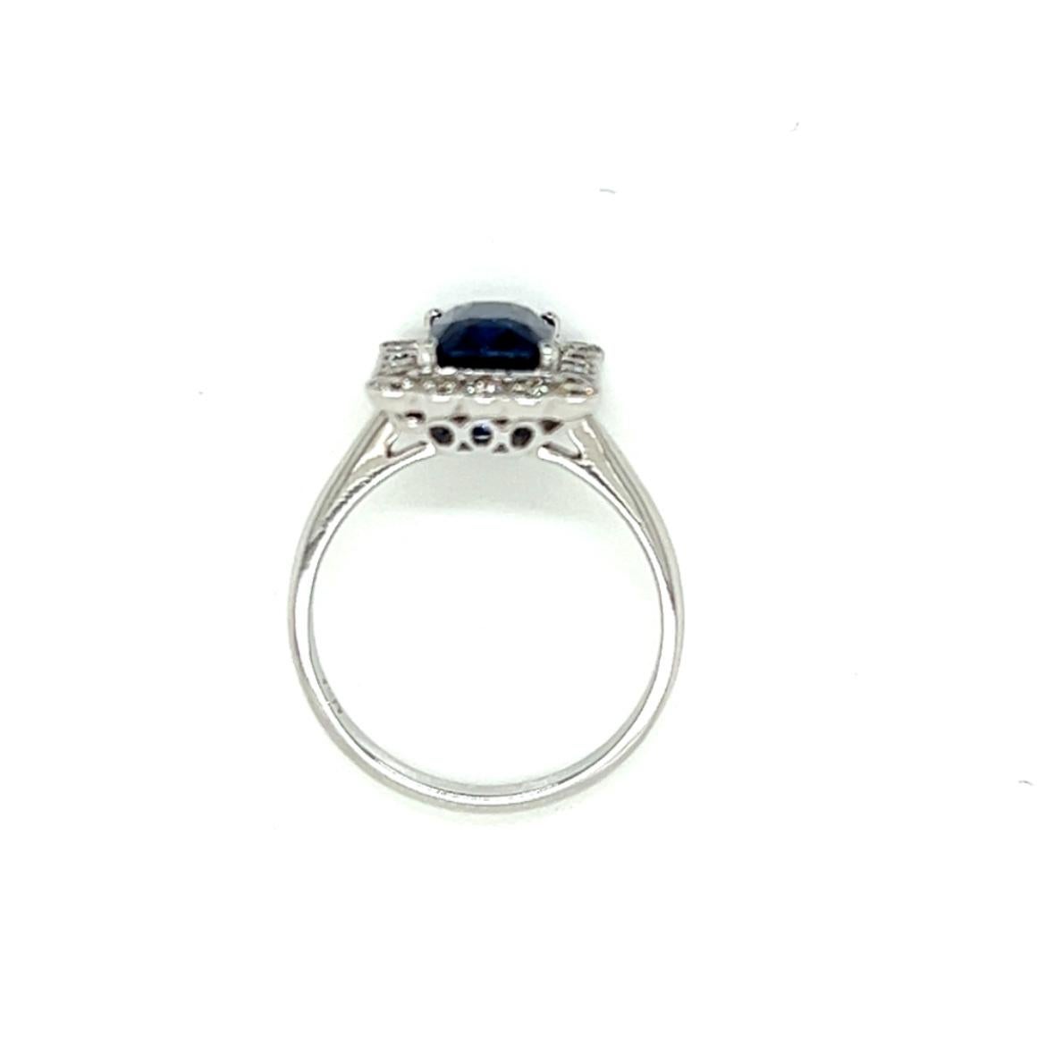 2.35 Carat Emerald cut Blue Sapphire and Diamond Cluster Ring in 18K White Gold For Sale 1