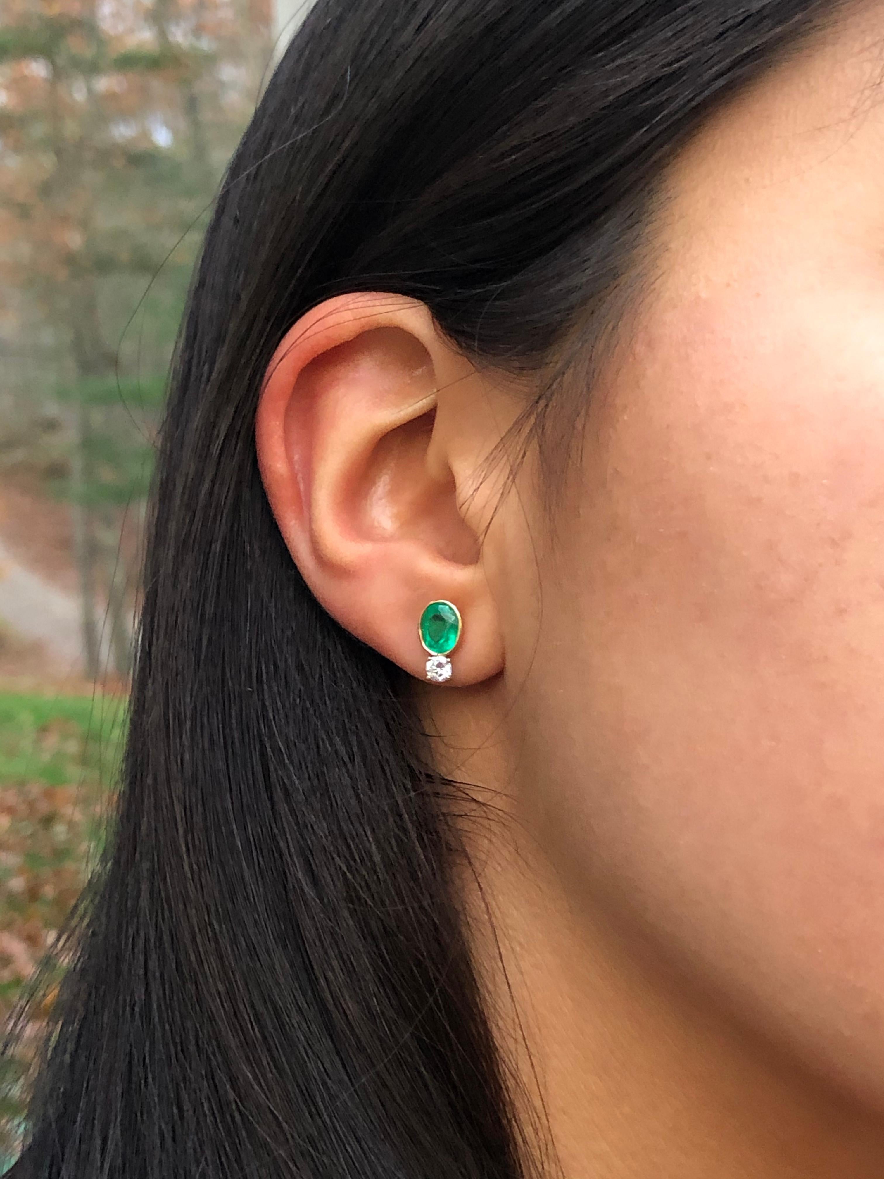 2.35 Carat Natural Colombian Emerald Diamond Stud Earrings 18k 
Primary Stones: 100% Natural Colombian Emeralds
Shape or Cut : Oval Cut
Average Color/Clarity : Beautiful AAA+ Medium Green/ Clarity, VS
Total Weight Emeralds: Approx. 2.00 Carats (2