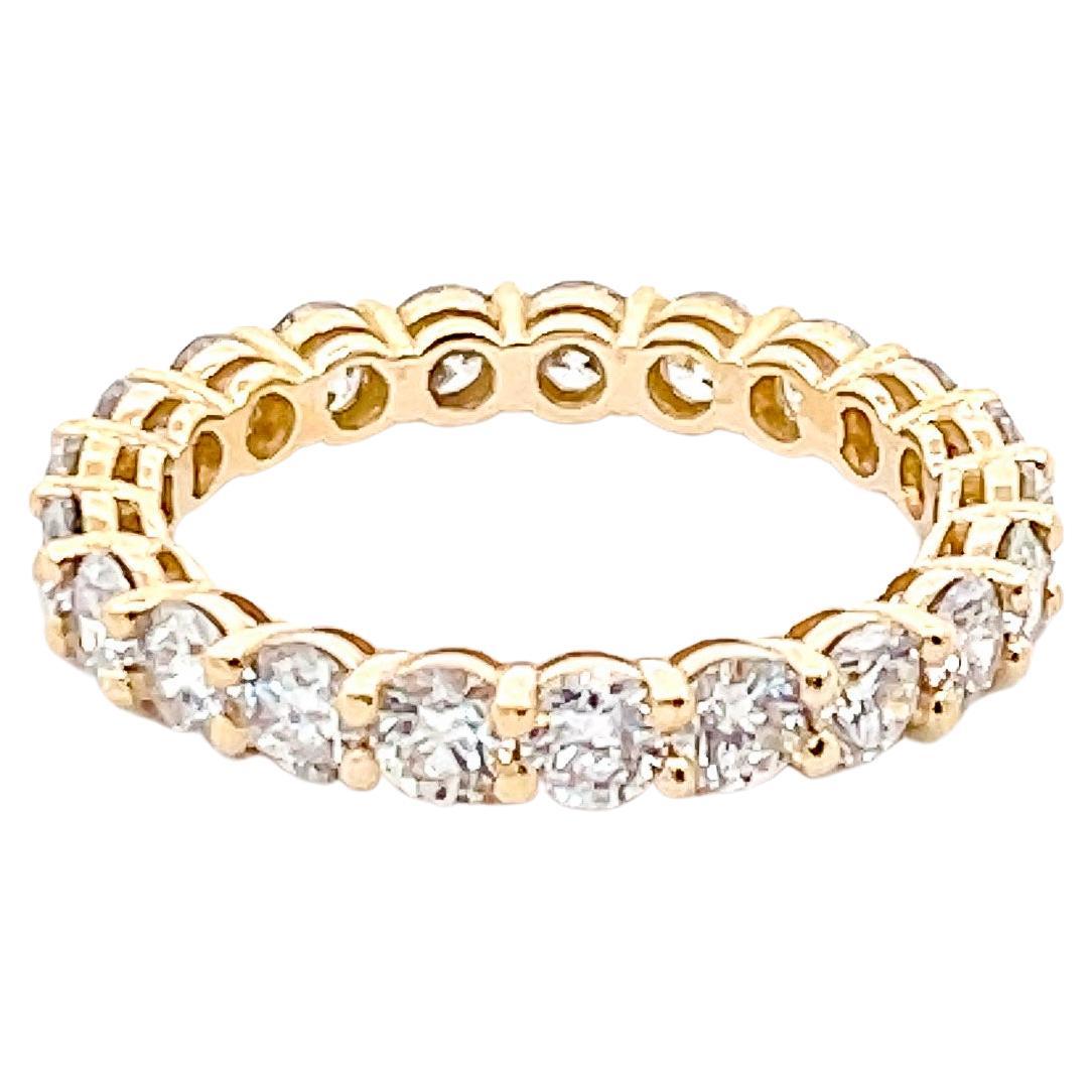 2.35 Carat Round Brilliant Cut Diamond Eternity Wedding Band in Yellow Gold For Sale