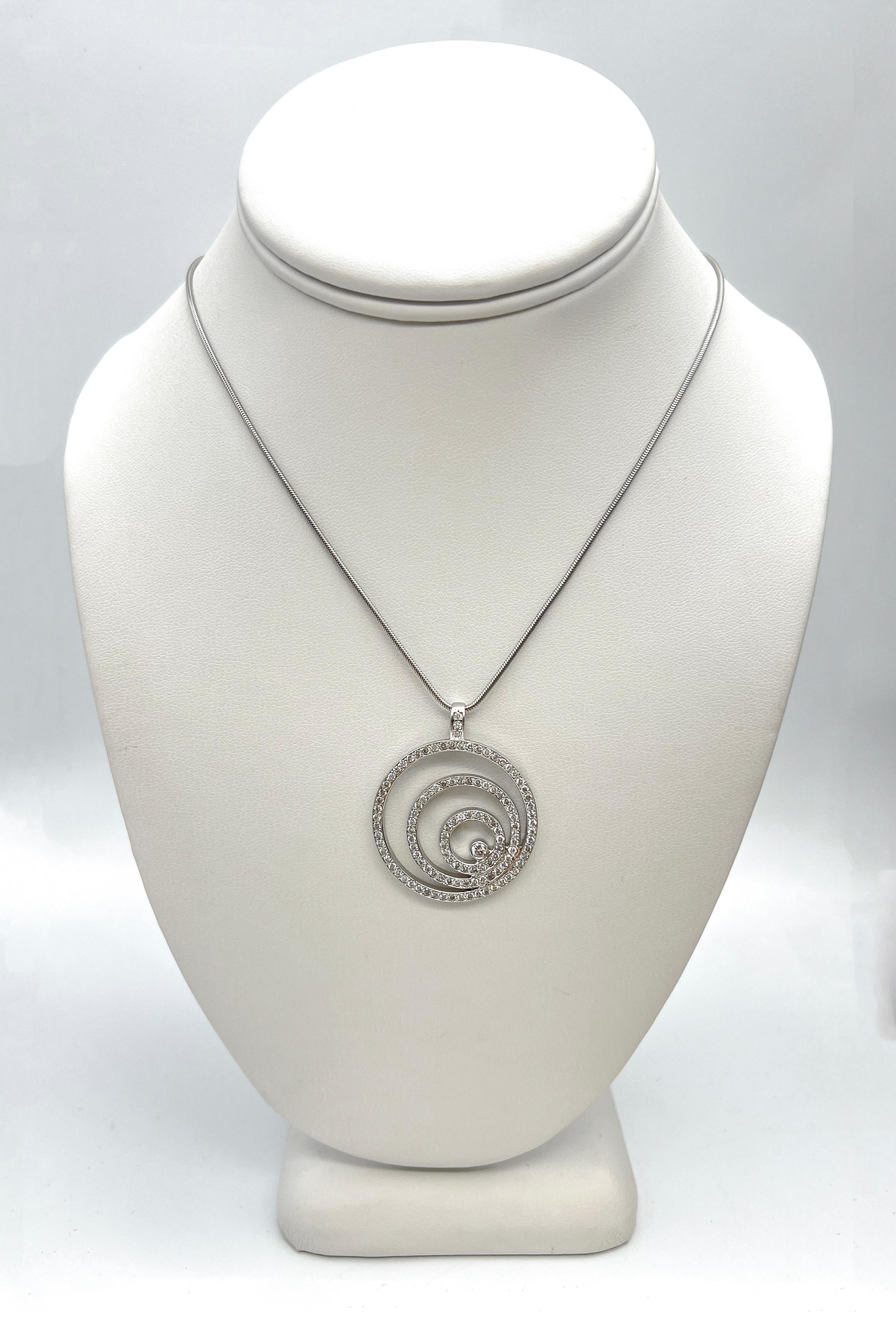 2.35 Carat Round Triple Circle Diamond Pendant Necklace

-Material: 18K White Gold;
-Diamonds: Round Cuts, 2.35ct total;
-Chain: 15.5 inches

Handmade in New York City.