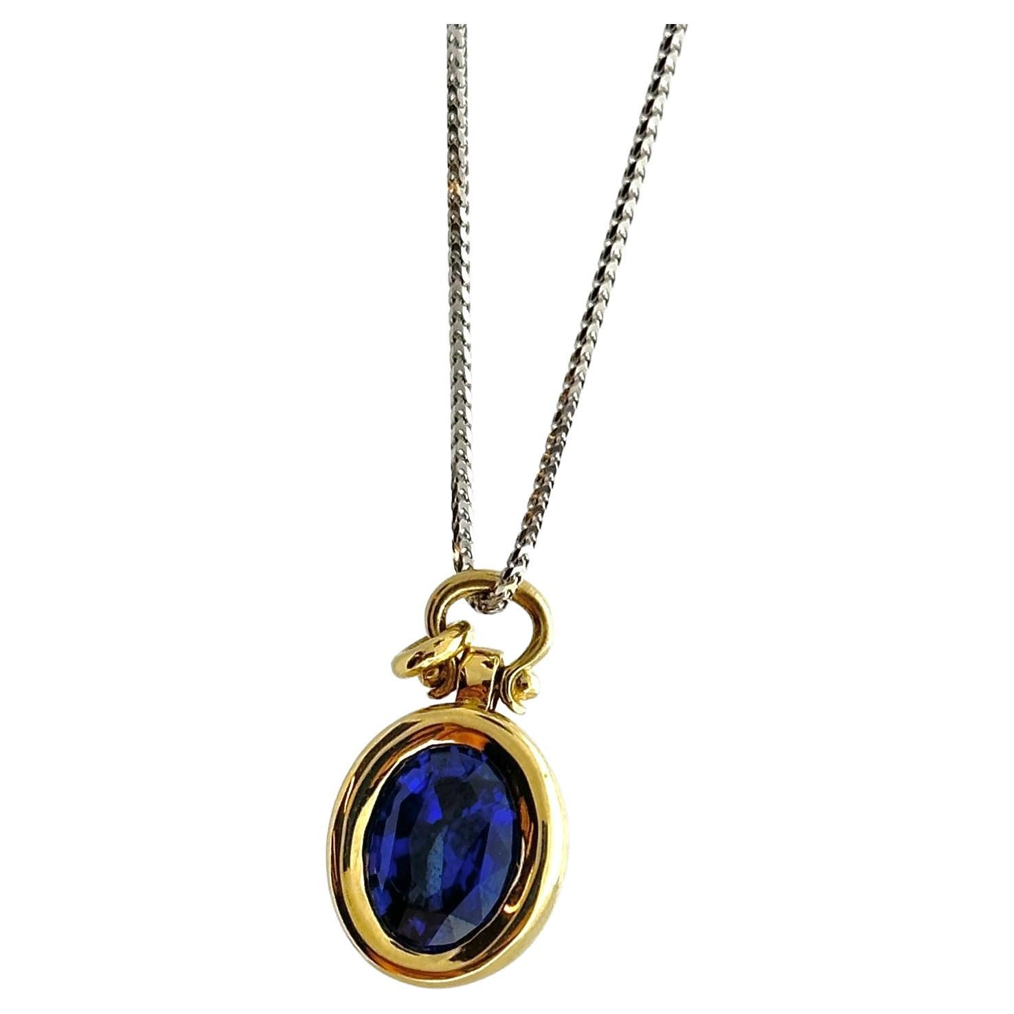 2.35 Carat Sapphire Oval Cut Necklaces In 14K Yellow Gold  For Sale