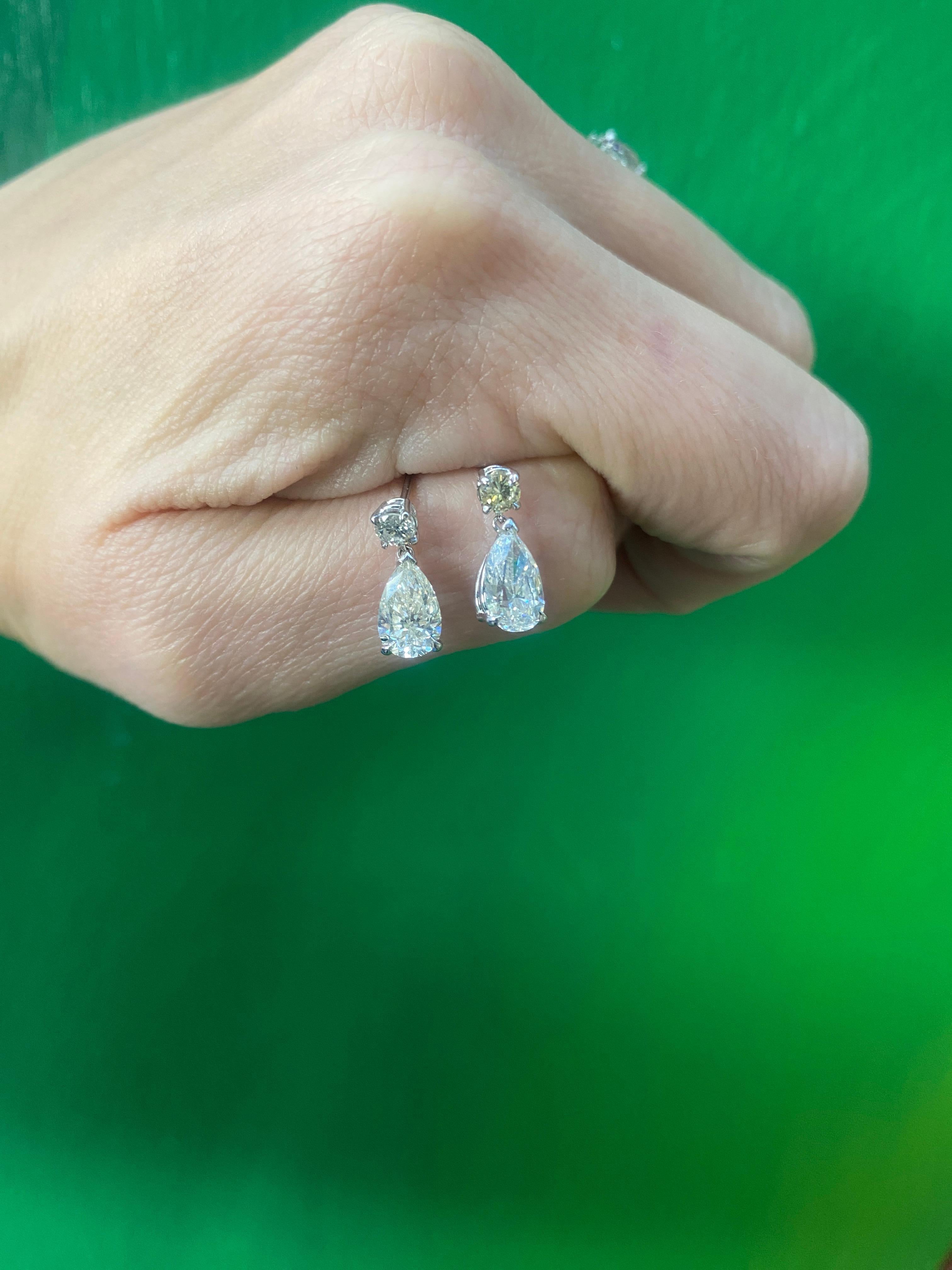 2.35 Carat Total Weight Pear Shaped Diamond Dangle Earrings, 14 Karat White Gold In New Condition For Sale In Houston, TX