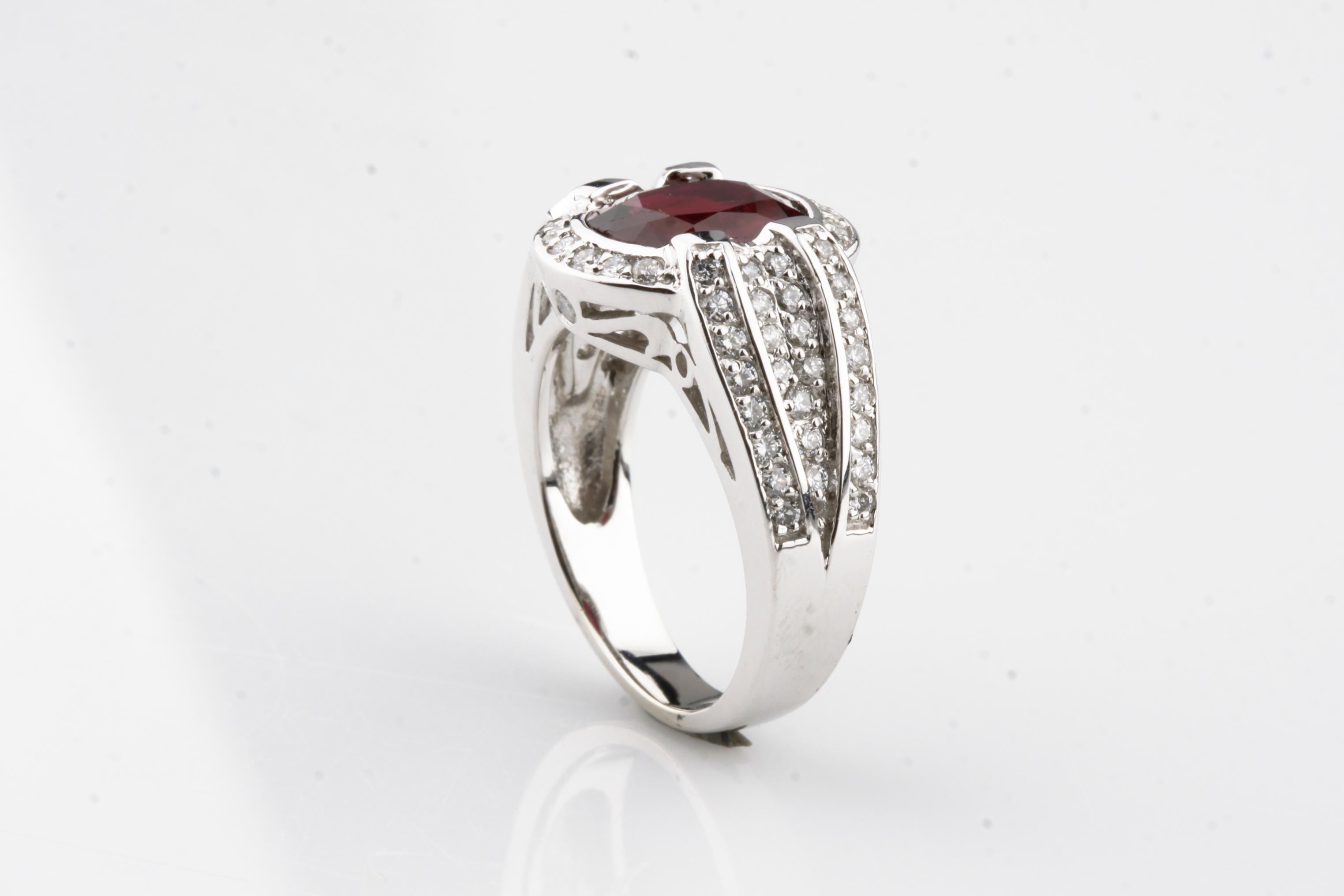 Oval Cut 2.35 Carat Natural Ruby Ring with Diamond Accents in White Gold For Sale