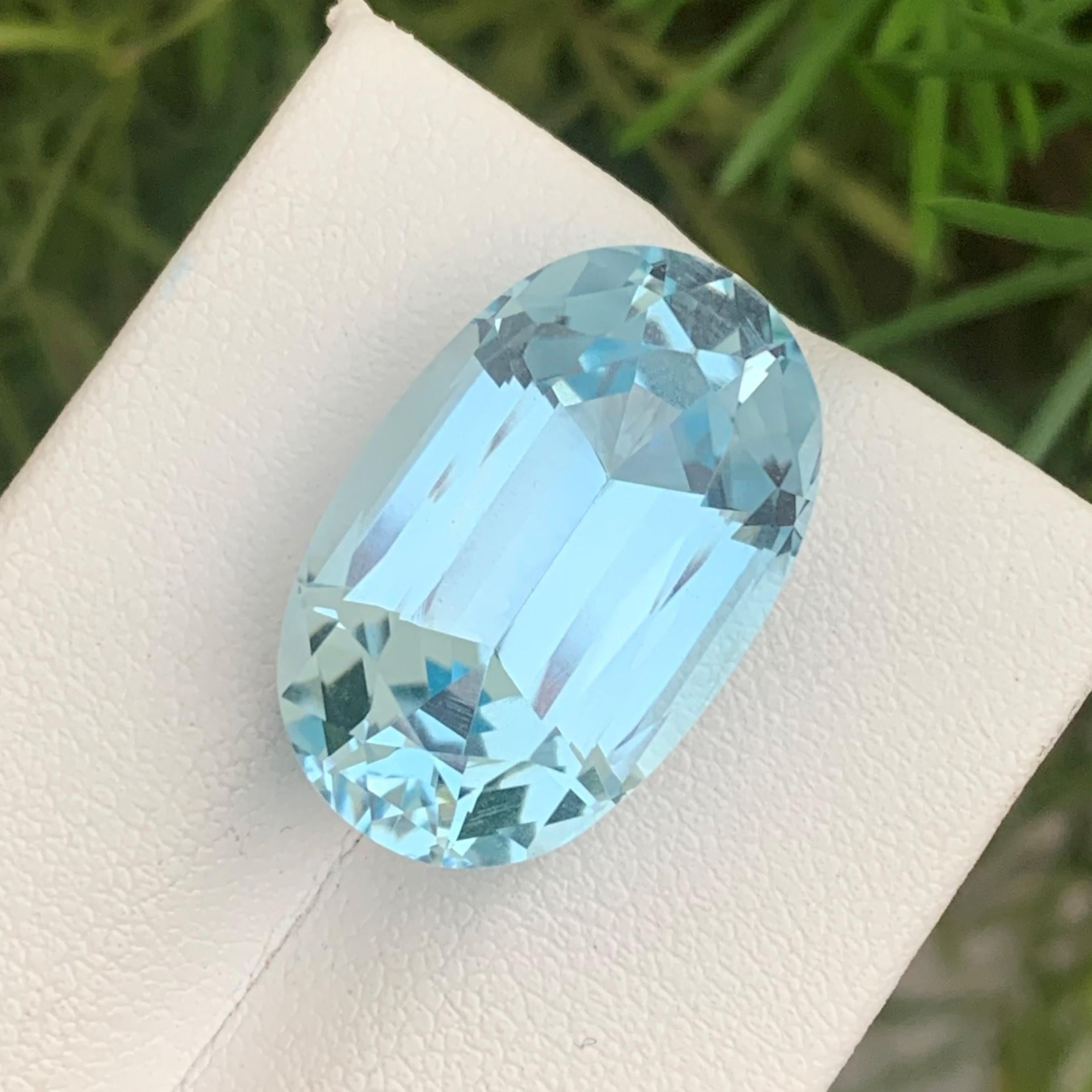 Faceted Sky Blue Topaz 
Weight : 23.50 Carats
Dimensions : 22x13.8x10 Mm
Origin : Brazil
Clarity : Eye Clean
Shape: Cushion
Cut/Facet: Long Cushion
Color: Light Blue
Certificate: On Demand
Blue Topaz Metaphysical Properties
Blue topaz, in