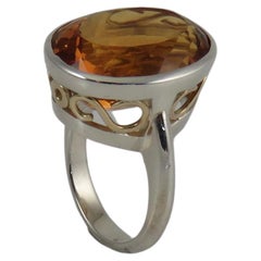 23.51 Carat Oval Golden Citrine Sterling Silver and 9k Yellow Gold Ring