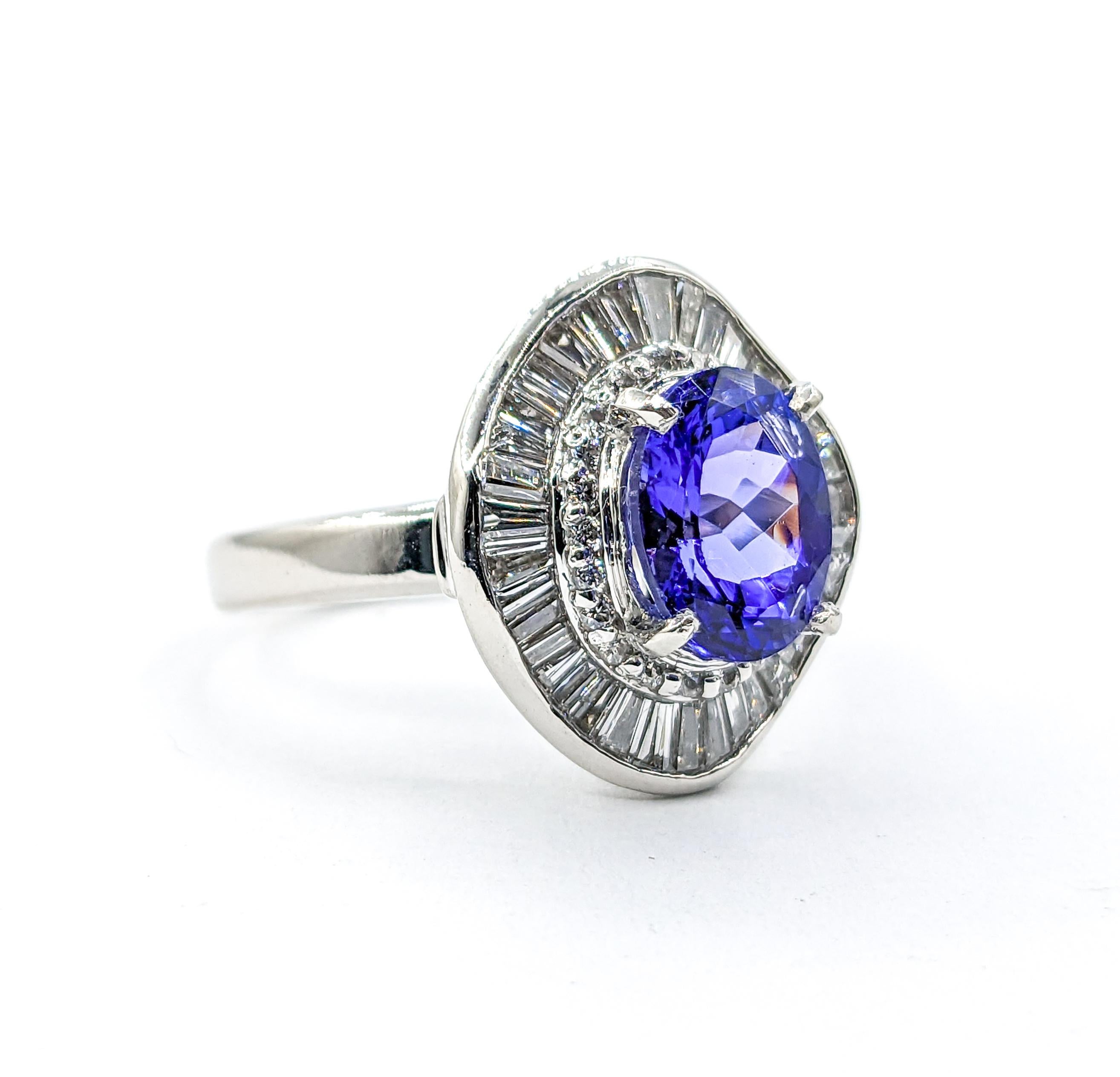 2.35ct Purple Tanzanite & Diamond Ring In 900 Platinum 

Introducing this stunning Tanzanite ring, masterfully crafted in 900 platinum, and adorned with 1.05ctw of tapered baguette and round diamonds. This piece boasts a stunning 2.35ct Purple
