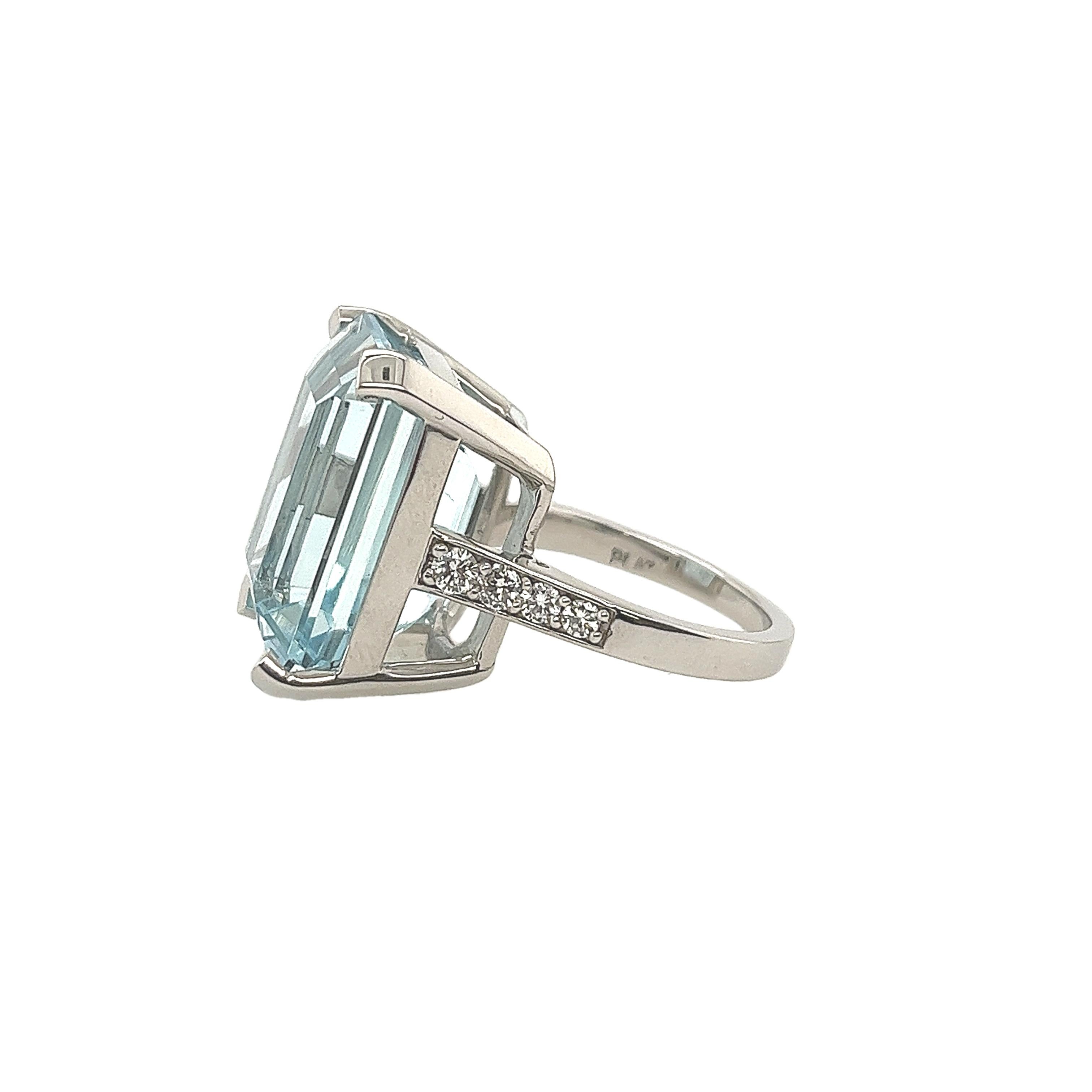 The aquamarine is the birthstone for March.
This beautiful ring features a 23.5ct emerald cut aquamarine,
set in a platinum band. 
The ring is decorated with 4 round brilliant diamonds on each shoulder.
Total Diamond Weight: 0.20ct 
Diamond Colour: