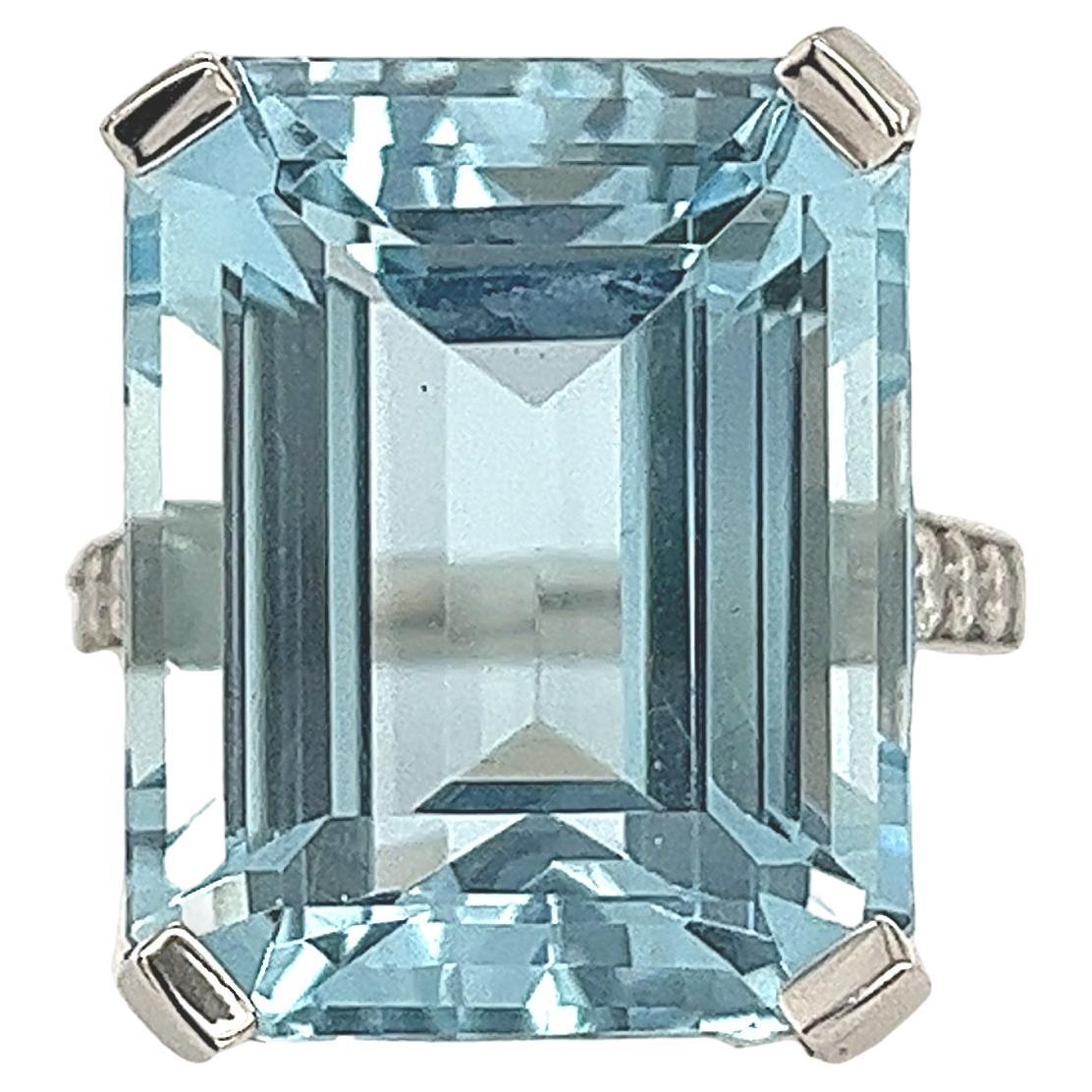 23.5ct Emerald Cut Aquamarine Set with 0.20ct of Diamonds in Platinum For Sale