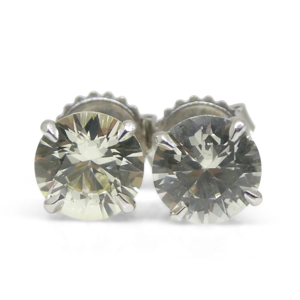 2.35ct Pair Round Pastel Yellow Sapphire Stud Earrings set in Platinum, Unheated In New Condition In Toronto, Ontario