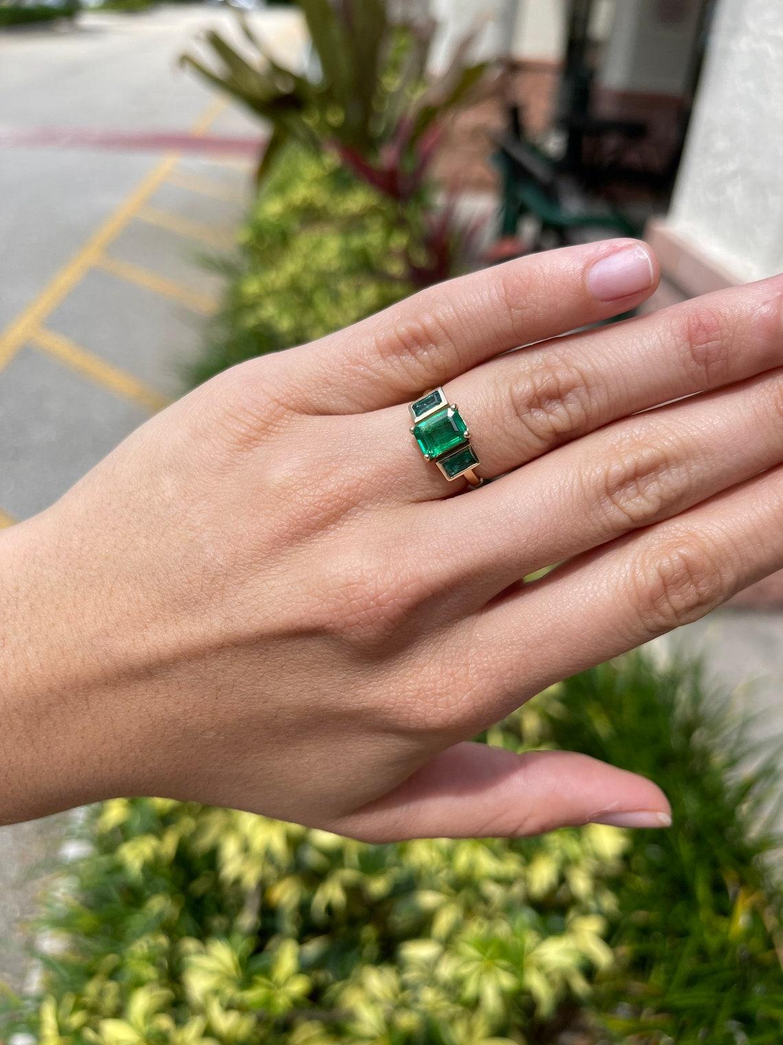 triple emerald ring