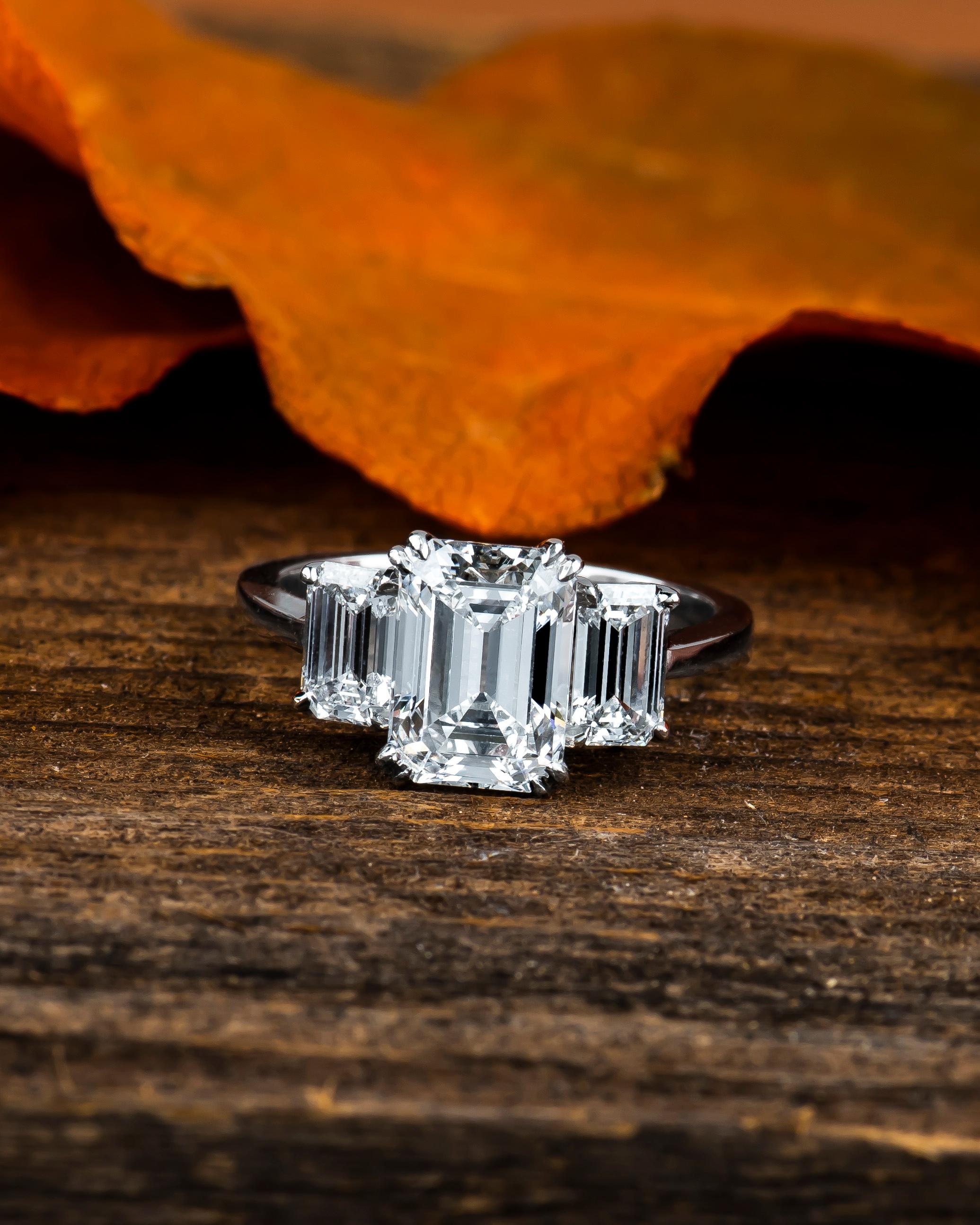 3 diamond emerald cut ring