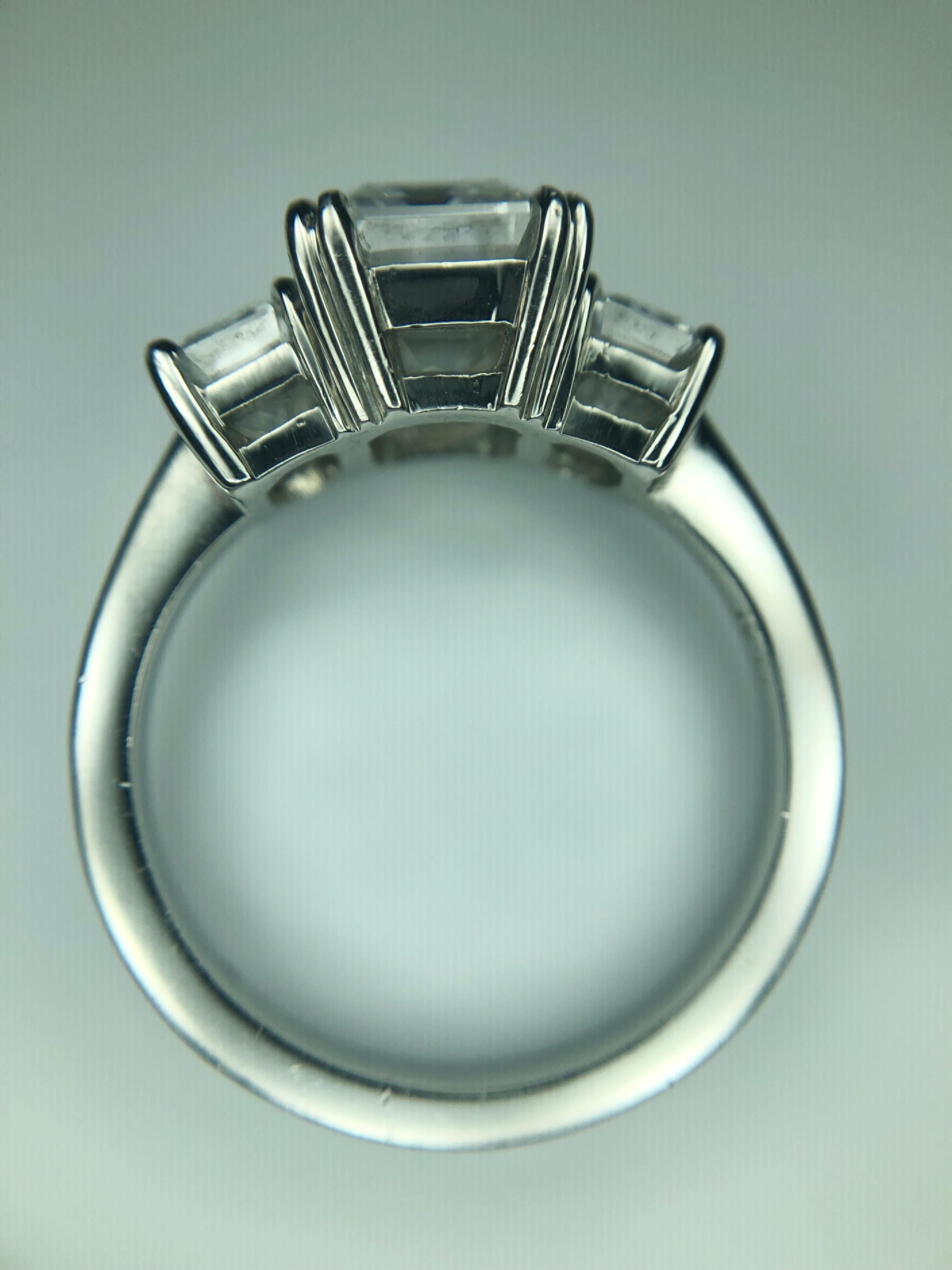 2.36 Carat D VVS2 'GIA' Emerald Cut Diamond, 1.02 Carat Sides, 3-Stone Ring In New Condition In Houston, TX