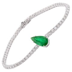 Bracciale tennis in oro 14 carati con diamante smeraldo da 2,36 carati