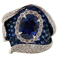 2.36 Carat Natural Oval-Cut Royal Blue Sapphire and White Diamond Gold Ring