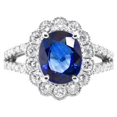 2.36 Carat Natural Sapphire and Diamond Halo Ring Set in Platinum 2.36 Carat Natural Sapphire and Diamond Halo Ring Set in Platinum