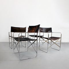 236 Set of 4 "April" folding chairs with chromed steel frame and leather