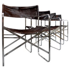 236 Set of 4 "April" folding chairs with chromed steel frame and leather
