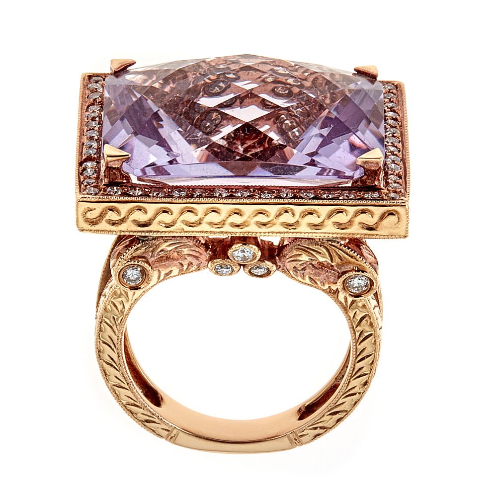 23.65 Carat Amethyst Diamond Solitaire 18 Karat Rose Gold Cocktail Ring Size 7


Dazzling Cushion Cut ring, set in stunning 18k Rose Gold. 23 TCW cushion cut vivid amethyst is centered atop of the ring, embraced by the halo of white round diamonds