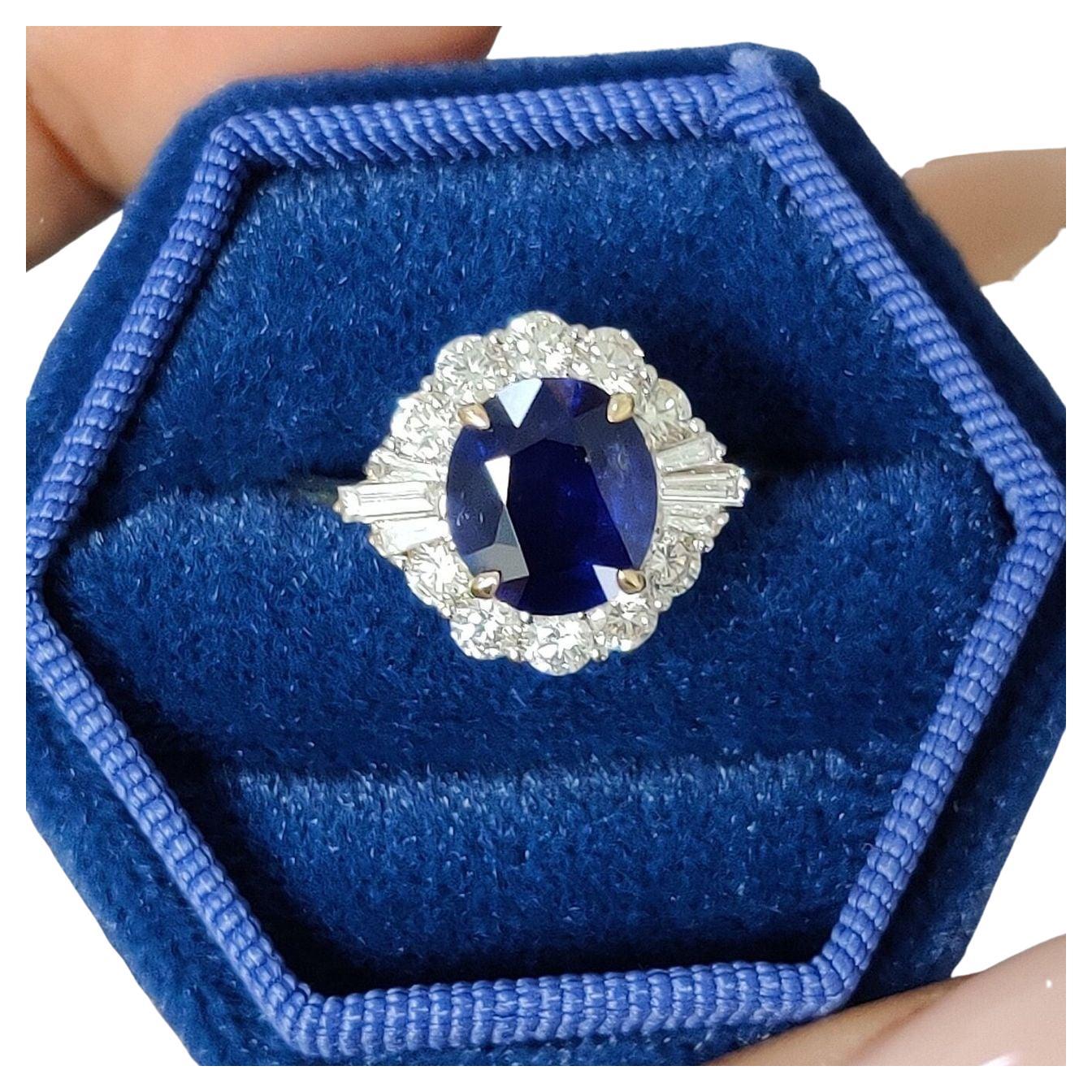 Behold the allure of the 2.37 Carat Ceylon Blue Sapphire & Diamond Ring, a captivating testament to exquisite craftsmanship and natural beauty. The centerpiece of this ring is a resplendent 2.37-carat oval-shaped Ceylon Blue Sapphire. Originating