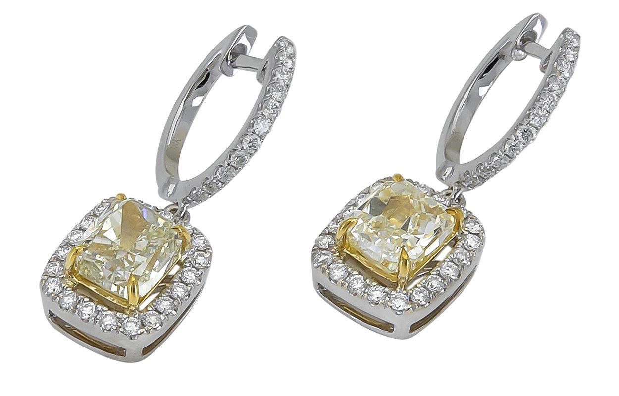 Women's or Men's 2.37 Carat Cushion Cut Yellow Diamond Halo Dangle Earrings in 18k White Gold For Sale