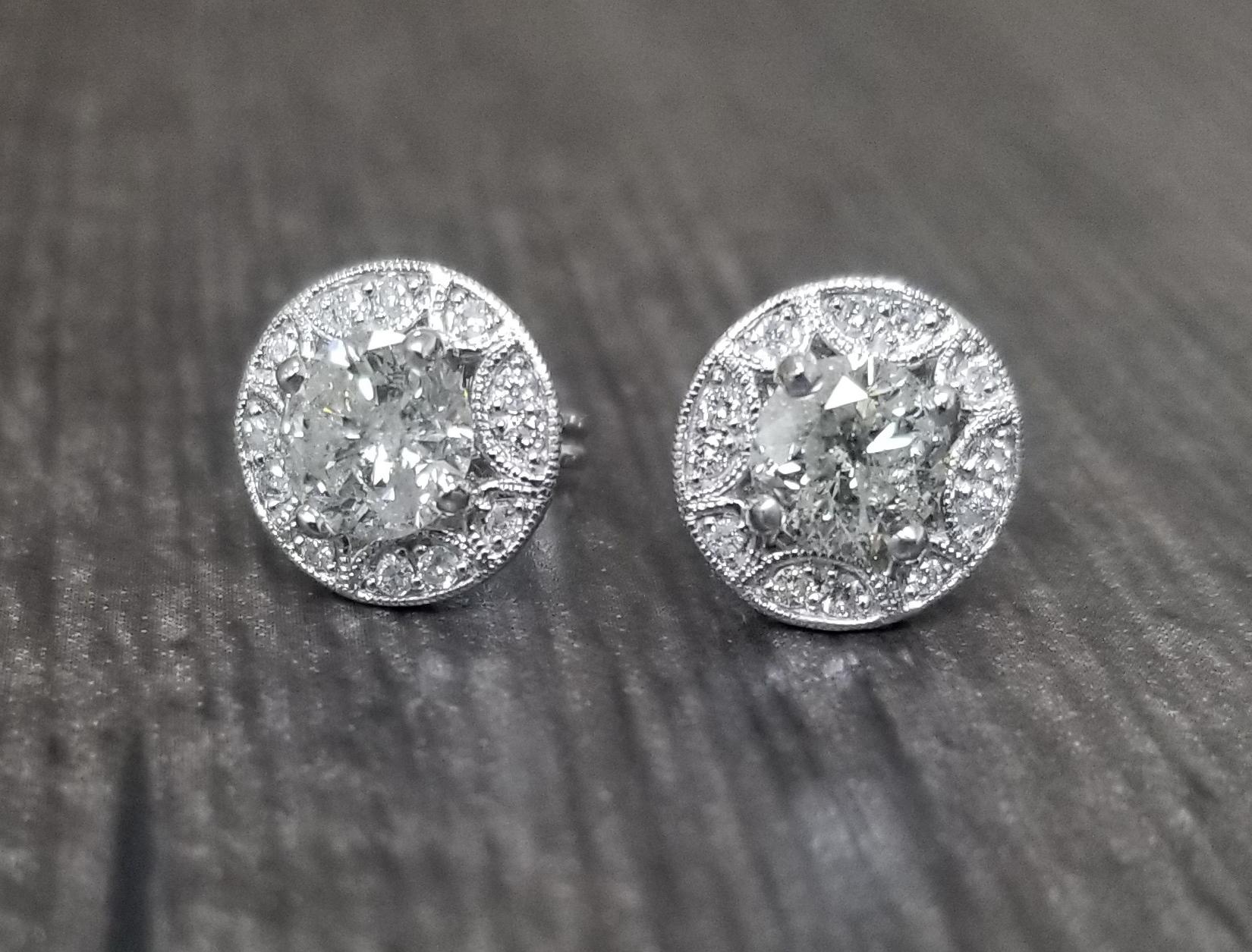 14k white gold diamond stud earrings with halo, containing 2 brilliant cut diamonds; color 