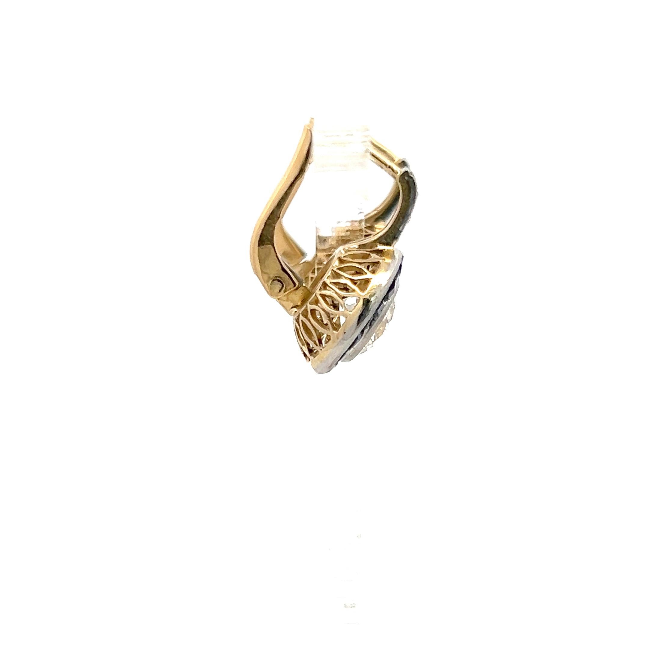 Title:
2.37 Carat Old European Cut I I1 and Circular Brilliant Cut I I1 Diamond 0.50 Carat Tapered Baguette Shape Sapphire 18 Karat Two Tone Gold/Platinum Leverback Earrings
Style:
Leverback
Metal:
18 Karat Two Tone Gold/Plat
Gemstone 1:
1.27 Carat