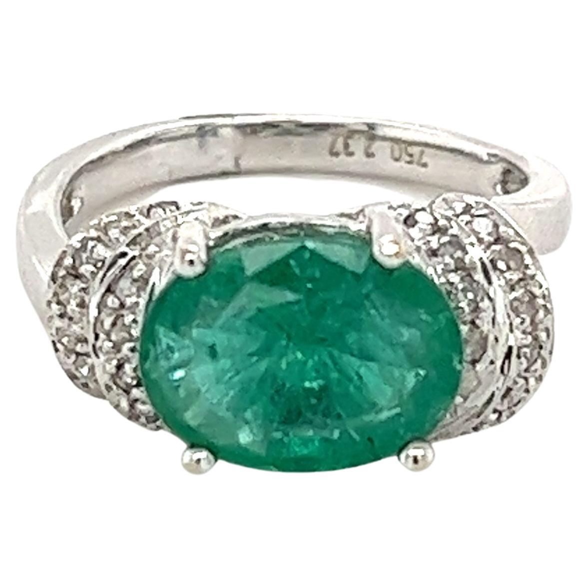 2.37 Carat Oval Cut Colombian Emerald in Retro Curved White Gold 4-Prong Ring  For Sale