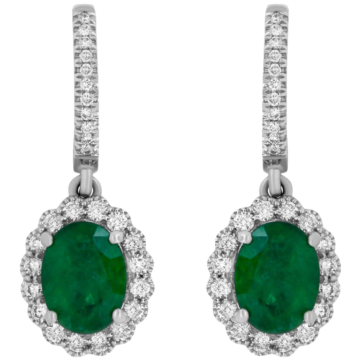 White Gold Oval Shaped Emerald and White Diamond Halo Drop Earring For Sale
