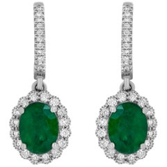 White Gold Oval Shaped Emerald and White Diamond Halo Drop Earring