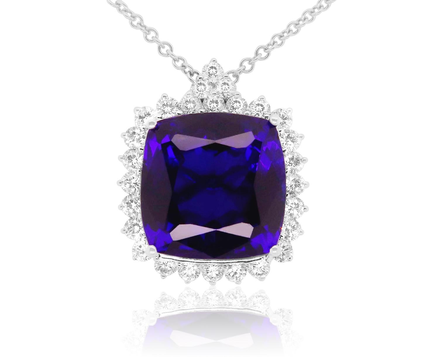 18k White Gold
Center Stone: 1 Cushion Cut Tanzanite at 23.70 Carats- Measuring 16.7 x 16.7 mm
Diamonds: 20 Brilliant White Round Diamonds at 2.46 Carats - Color: HI - Clarity: SI

Fine one-of-a-kind craftsmanship meets incredible quality in this