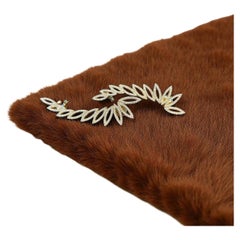 2,370 Diamante e Foglia d
Oro da 15g