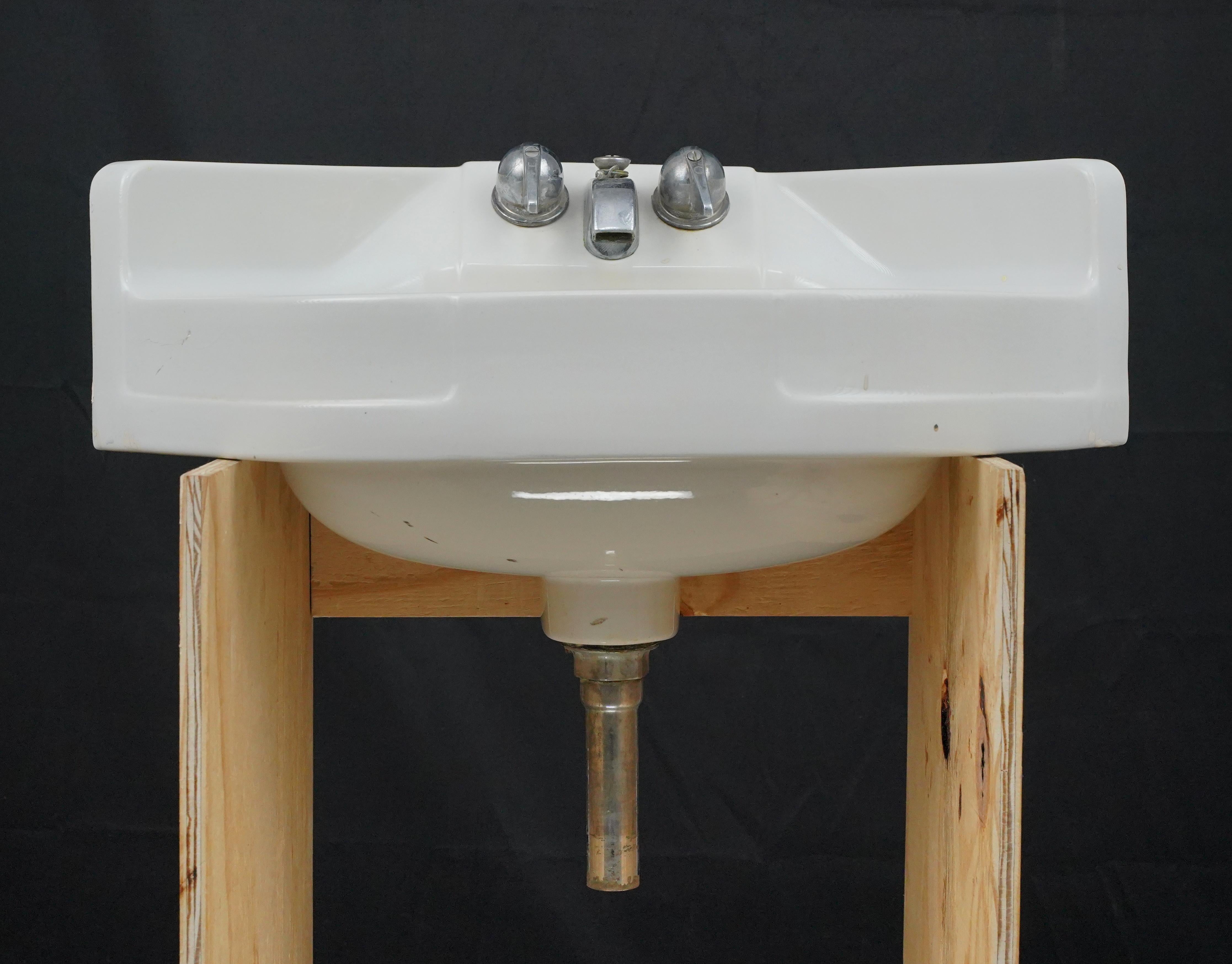 Ceramic 23.75 in. Crane Cornate White Corner Wall Sink For Sale