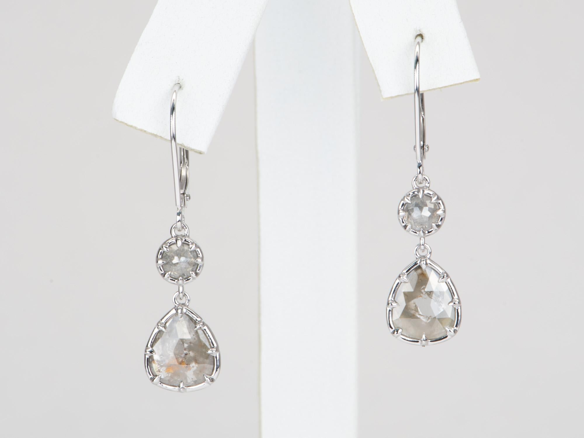 Exquisite craftsmanship and timeless design combine in these elegant Georgian-inspired dangle earrings. Featuring sparkling rose cut diamonds and 14K white gold, these earrings radiate a regal beauty that will turn heads in any setting. The perfect