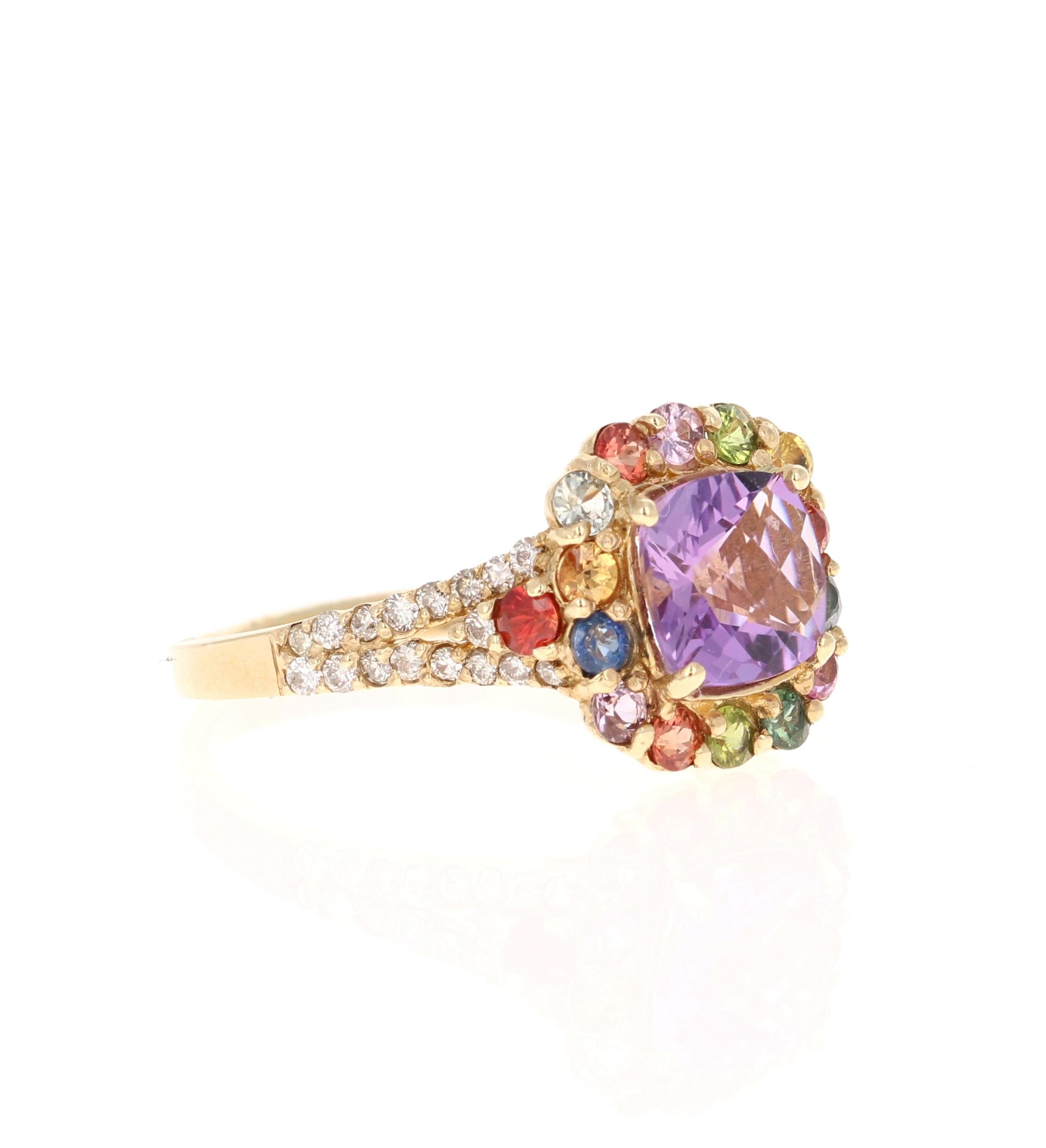 Beautiful 2.38 Carat Amethyst, Multi-Sapphire and Diamond Cocktail Ring! 

This uniquely designed Ring has a 1.25 carat Cushion Amethyst in the center of the ring which is surrounded by 16 Round Cut Multi-Colored Sapphires that weigh 0.80 carats. 